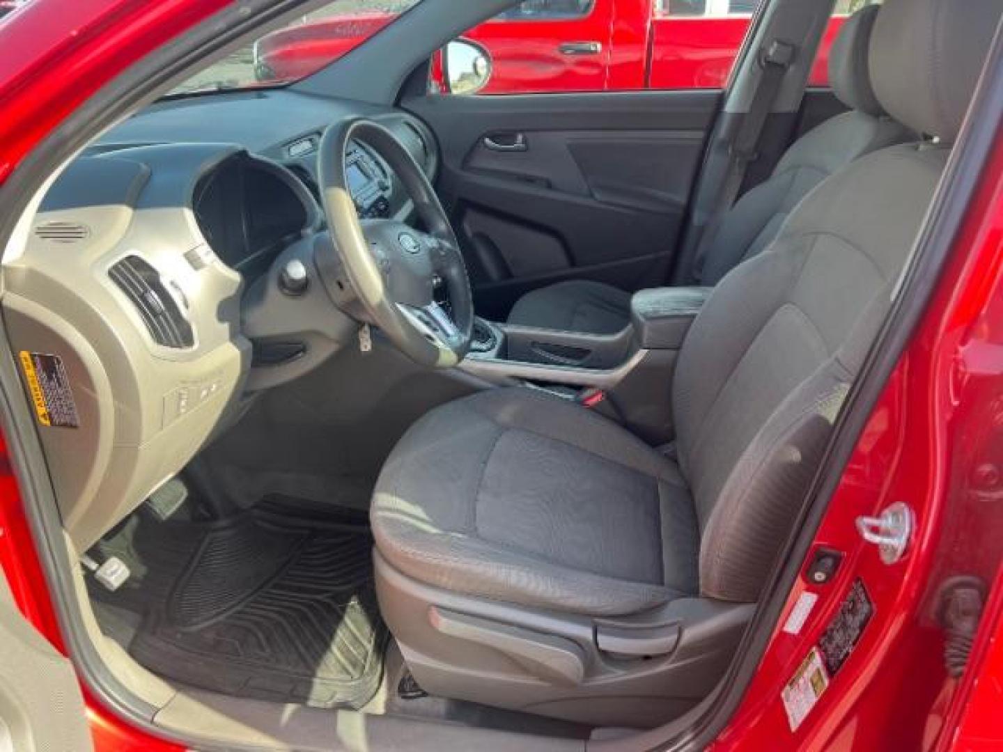 2011 Signal Red Metallic /Alpine Gray Cloth Interior Kia Sportage LX FWD (KNDPB3A27B7) with an 2.4L V6 DOHC 24V engine, 6-Speed Automatic transmission, located at 1865 East Red Hills Pkwy, St. George, 84770, (435) 628-0023, 37.120850, -113.543640 - This vehicle is a Mechanic Special. This means it will need some love. Runs a drives fine but has body damage, leaks or other mechanical issues. It did NOT pass our 50 point inspection. Get a great deal on a less than perfect car. These cars do NOT qualify for our in house financing. Cash and carry,- Photo#6