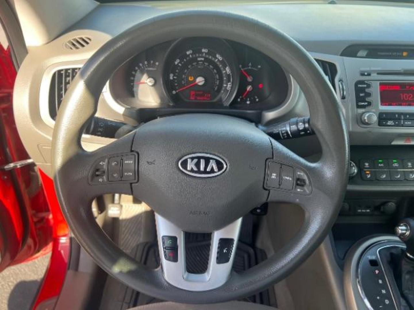 2011 Signal Red Metallic /Alpine Gray Cloth Interior Kia Sportage LX FWD (KNDPB3A27B7) with an 2.4L V6 DOHC 24V engine, 6-Speed Automatic transmission, located at 1865 East Red Hills Pkwy, St. George, 84770, (435) 628-0023, 37.120850, -113.543640 - This vehicle is a Mechanic Special. This means it will need some love. Runs a drives fine but has body damage, leaks or other mechanical issues. It did NOT pass our 50 point inspection. Get a great deal on a less than perfect car. These cars do NOT qualify for our in house financing. Cash and carry,- Photo#7