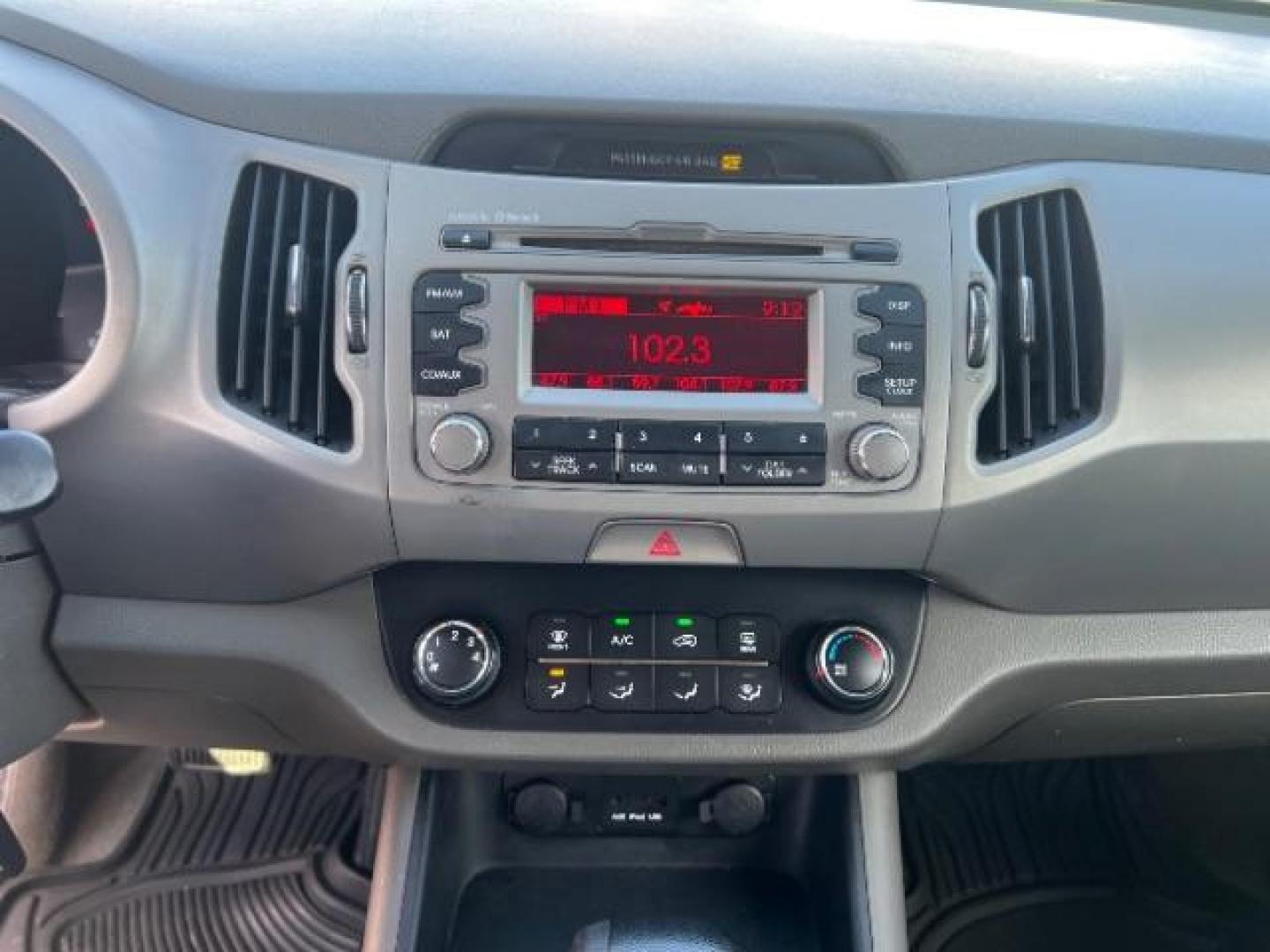 2011 Signal Red Metallic /Alpine Gray Cloth Interior Kia Sportage LX FWD (KNDPB3A27B7) with an 2.4L V6 DOHC 24V engine, 6-Speed Automatic transmission, located at 1865 East Red Hills Pkwy, St. George, 84770, (435) 628-0023, 37.120850, -113.543640 - This vehicle is a Mechanic Special. This means it will need some love. Runs a drives fine but has body damage, leaks or other mechanical issues. It did NOT pass our 50 point inspection. Get a great deal on a less than perfect car. These cars do NOT qualify for our in house financing. Cash and carry,- Photo#9
