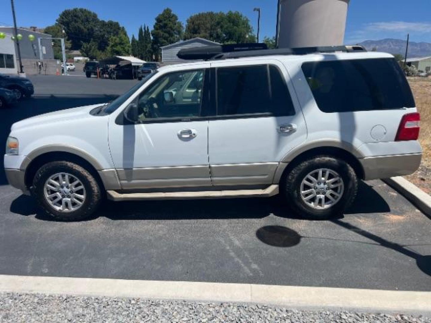 2010 Oxford White /Camel Leather Interi Ford Expedition Eddie Bauer 4WD (1FMJU1J58AE) with an 5.4L V8 SOHC 16V FFV engine, 6-Speed Automatic transmission, located at 1865 East Red Hills Pkwy, St. George, 84770, (435) 628-0023, 37.120850, -113.543640 - This vehicle is a Mechanic Special. This means it will need some love. Runs a drives fine but has body damage, leaks or other mechanical issues. It did NOT pass our 50 point inspection. Get a great deal on a less than perfect car. These cars do NOT qualify for our in house financing. Cash and carry, - Photo#3