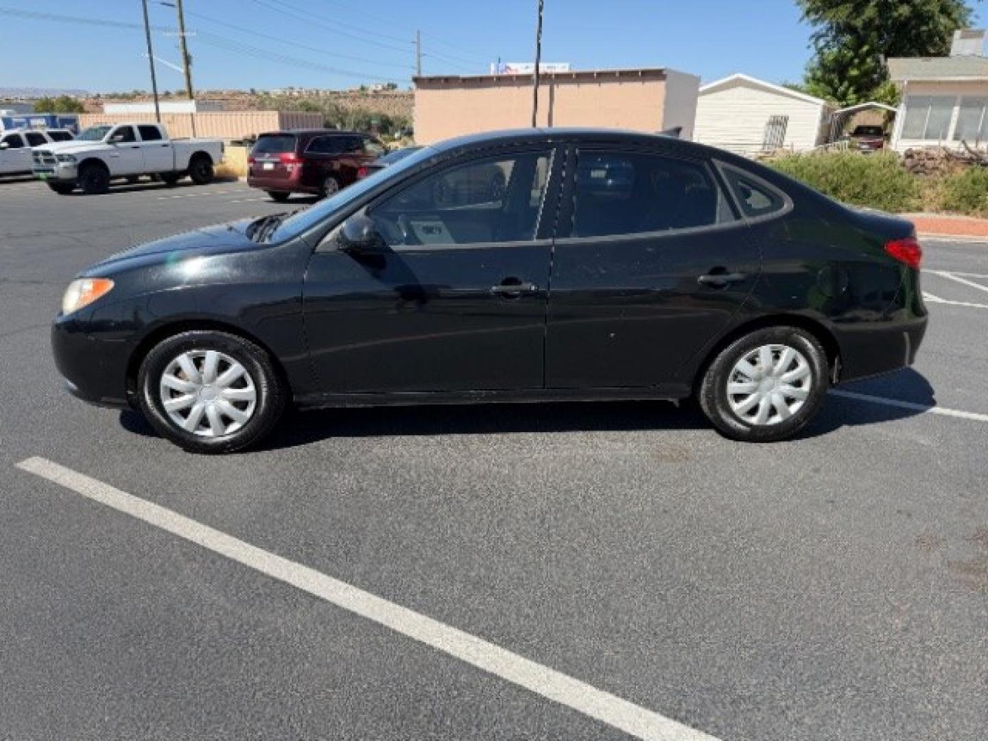 2010 Ebony Black /Gray Cloth Interior Hyundai Elantra SE (KMHDU4AD3AU) with an 2.0L L4 DOHC 16V engine, 4-Speed Automatic transmission, located at 940 North Main Street, Cedar City, UT, 84720, (435) 628-0023, 37.692936, -113.061897- Photo#3