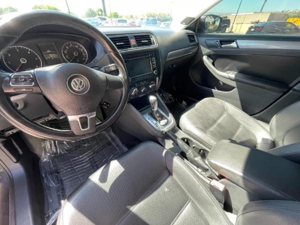 2013 Purple /Black Leather Volkswagen Jetta TDI (3VWLL7AJ8DM) with an 2.0L L4 DOHC 16V DIE engine, 6-Speed Automatic transmission, located at 1865 East Red Hills Pkwy, St. George, 84770, (435) 628-0023, 37.120850, -113.543640 - Photo #9