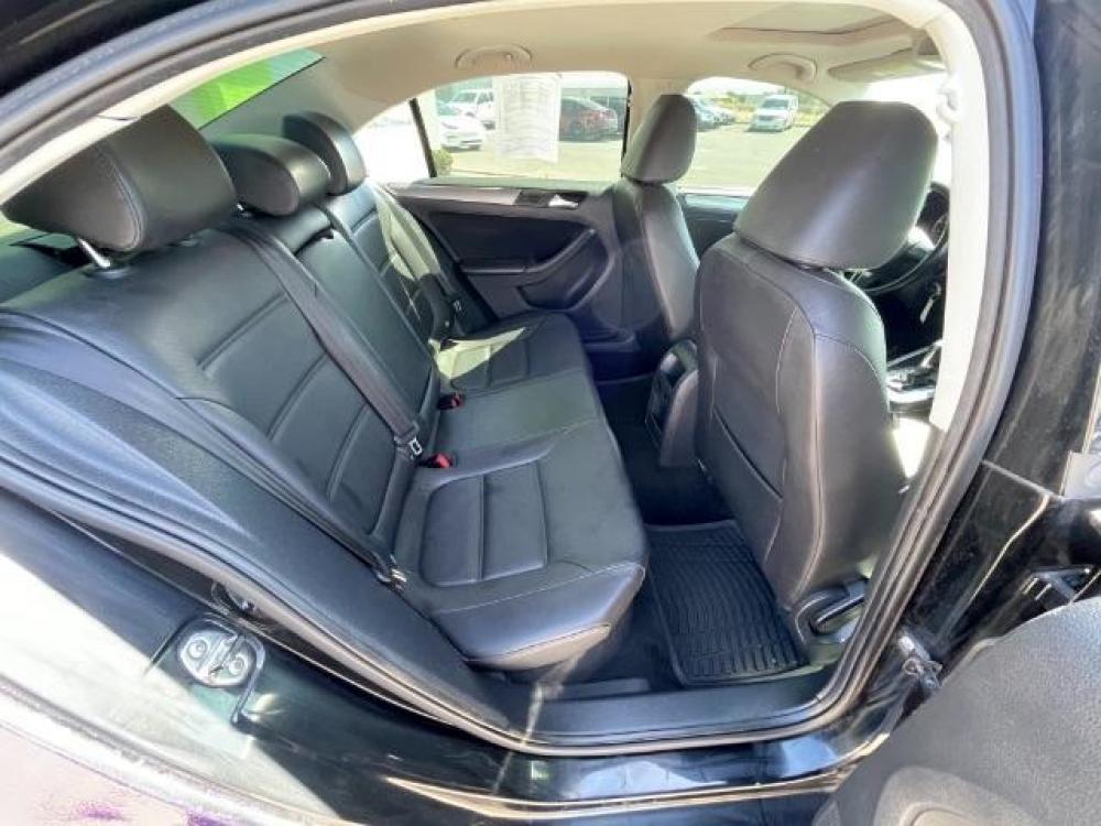 2013 Purple /Black Leather Volkswagen Jetta TDI (3VWLL7AJ8DM) with an 2.0L L4 DOHC 16V DIE engine, 6-Speed Automatic transmission, located at 1865 East Red Hills Pkwy, St. George, 84770, (435) 628-0023, 37.120850, -113.543640 - Photo #16