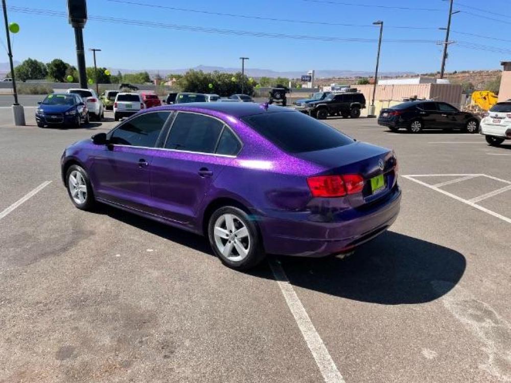 2013 Purple /Black Leather Volkswagen Jetta TDI (3VWLL7AJ8DM) with an 2.0L L4 DOHC 16V DIE engine, 6-Speed Automatic transmission, located at 1865 East Red Hills Pkwy, St. George, 84770, (435) 628-0023, 37.120850, -113.543640 - Photo #4
