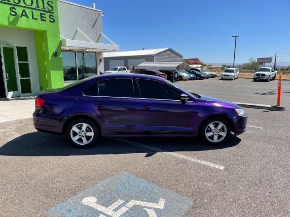 2013 Purple /Black Leather Volkswagen Jetta TDI (3VWLL7AJ8DM) with an 2.0L L4 DOHC 16V DIE engine, 6-Speed Automatic transmission, located at 1865 East Red Hills Pkwy, St. George, 84770, (435) 628-0023, 37.120850, -113.543640 - Photo #7