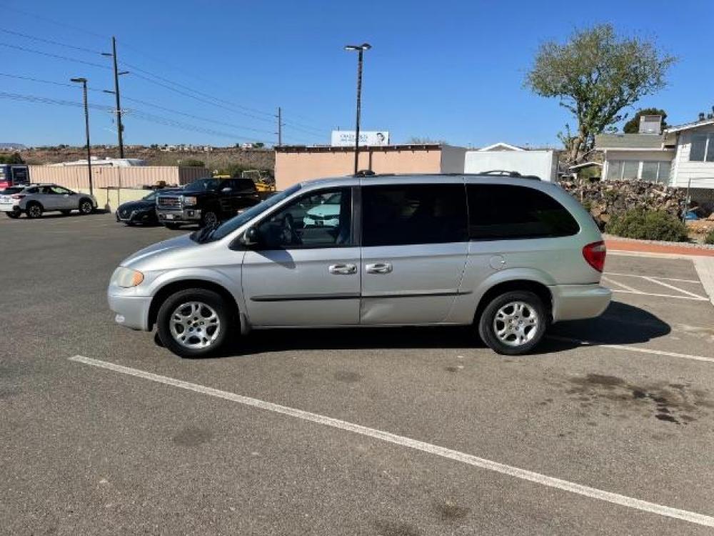 2001 Bright Silver Metallic Clearcoat Dodge Grand Caravan EX (2B4GP74L11R) with an 3.8L V6 OHV 12V engine, 4-Speed Automatic transmission, located at 1865 East Red Hills Pkwy, St. George, 84770, (435) 628-0023, 37.120850, -113.543640 - Photo #3