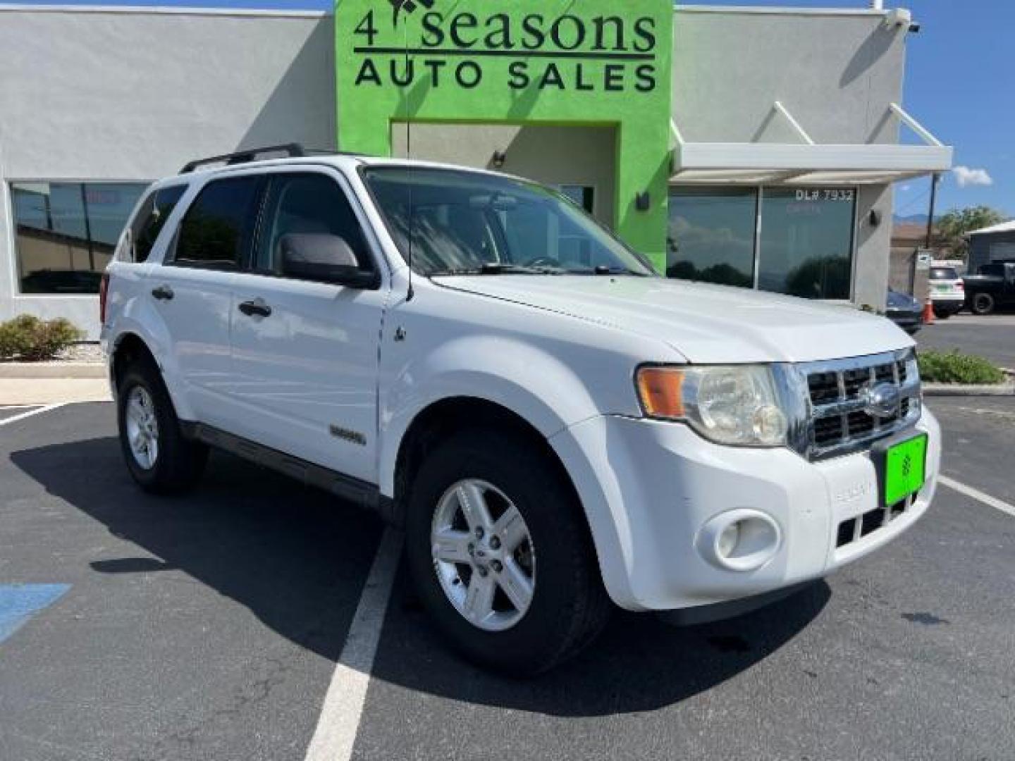 2008 Oxford White /Tan Leather Interior Ford Escape Hybrid FWD (1FMCU49H98K) with an 2.3L L4 DOHC 16V HYBRID engine, Continuously Variable Transmission transmission, located at 1865 East Red Hills Pkwy, St. George, 84770, (435) 628-0023, 37.120850, -113.543640 - This vehicle is a Mechanic Special. This means it will need some love. Runs a drives fine but has body damage, leaks or other mechanical issues. It did NOT pass our 50 point inspection. Get a great deal on a less than perfect car. These cars do NOT qualify for our in house financing. Cash and carry, - Photo#0