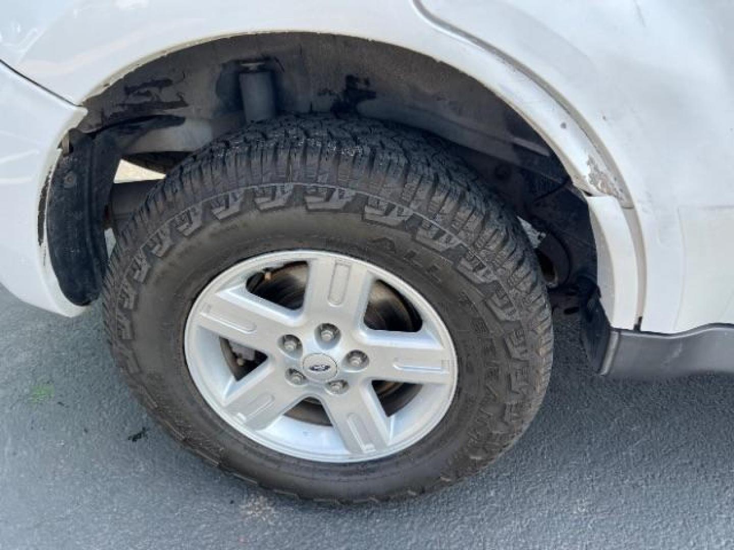 2008 Oxford White /Tan Leather Interior Ford Escape Hybrid FWD (1FMCU49H98K) with an 2.3L L4 DOHC 16V HYBRID engine, Continuously Variable Transmission transmission, located at 1865 East Red Hills Pkwy, St. George, 84770, (435) 628-0023, 37.120850, -113.543640 - This vehicle is a Mechanic Special. This means it will need some love. Runs a drives fine but has body damage, leaks or other mechanical issues. It did NOT pass our 50 point inspection. Get a great deal on a less than perfect car. These cars do NOT qualify for our in house financing. Cash and carry, - Photo#7