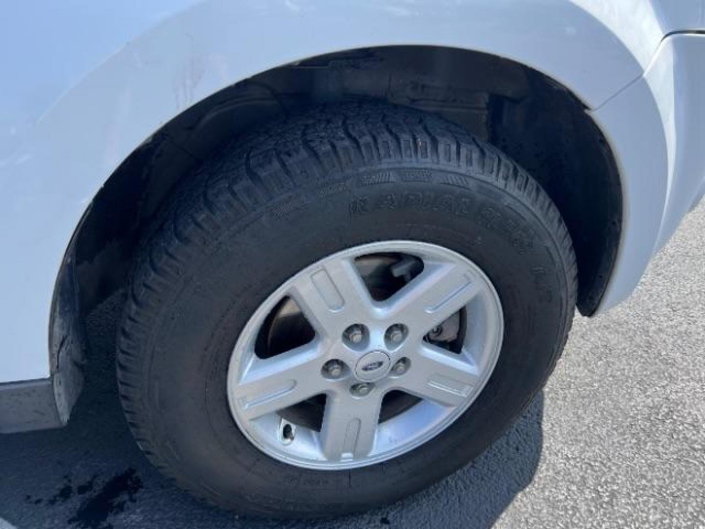 2008 Oxford White /Tan Leather Interior Ford Escape Hybrid FWD (1FMCU49H98K) with an 2.3L L4 DOHC 16V HYBRID engine, Continuously Variable Transmission transmission, located at 1865 East Red Hills Pkwy, St. George, 84770, (435) 628-0023, 37.120850, -113.543640 - This vehicle is a Mechanic Special. This means it will need some love. Runs a drives fine but has body damage, leaks or other mechanical issues. It did NOT pass our 50 point inspection. Get a great deal on a less than perfect car. These cars do NOT qualify for our in house financing. Cash and carry, - Photo#8