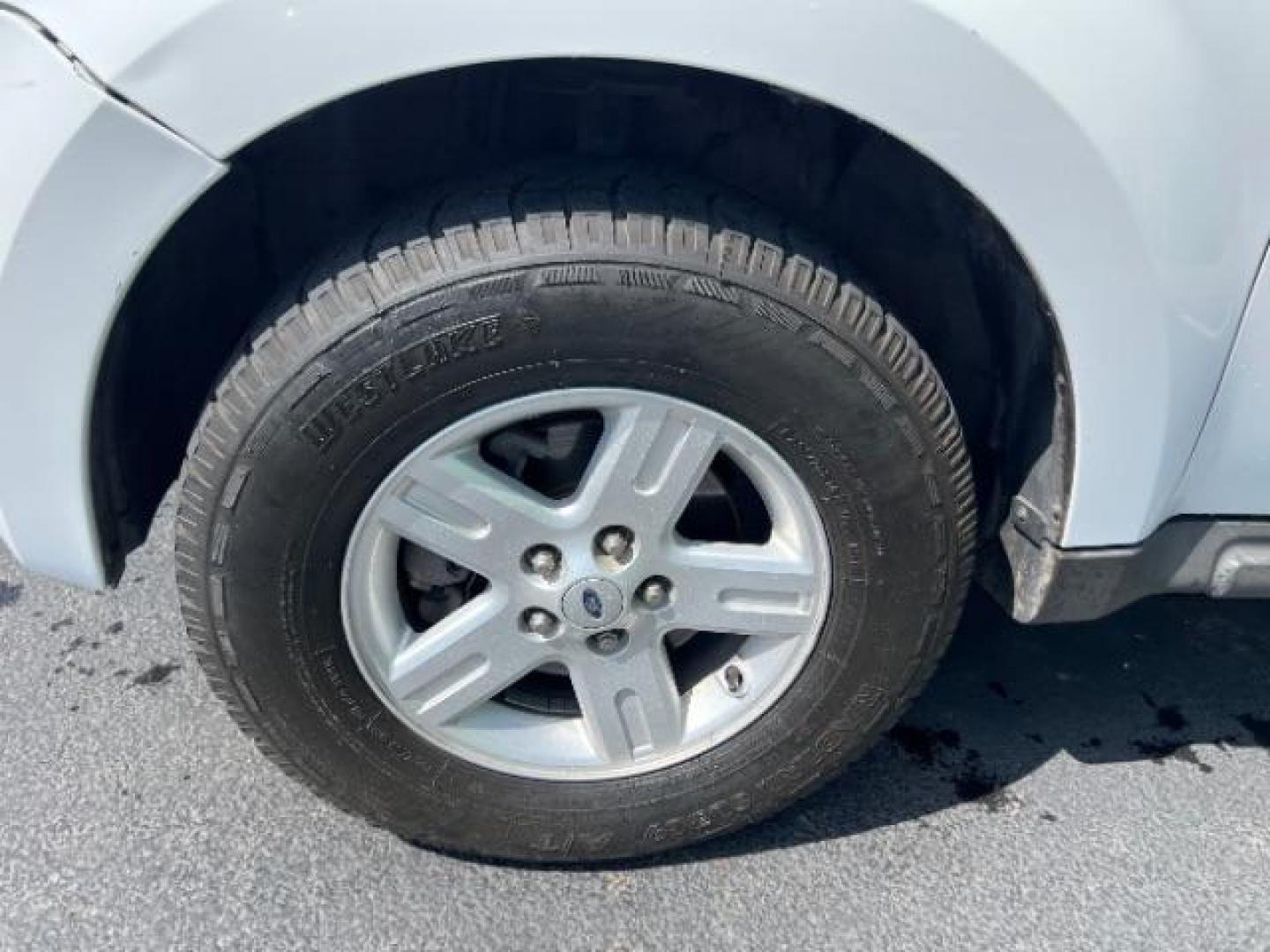 2008 Oxford White /Tan Leather Interior Ford Escape Hybrid FWD (1FMCU49H98K) with an 2.3L L4 DOHC 16V HYBRID engine, Continuously Variable Transmission transmission, located at 1865 East Red Hills Pkwy, St. George, 84770, (435) 628-0023, 37.120850, -113.543640 - This vehicle is a Mechanic Special. This means it will need some love. Runs a drives fine but has body damage, leaks or other mechanical issues. It did NOT pass our 50 point inspection. Get a great deal on a less than perfect car. These cars do NOT qualify for our in house financing. Cash and carry, - Photo#11