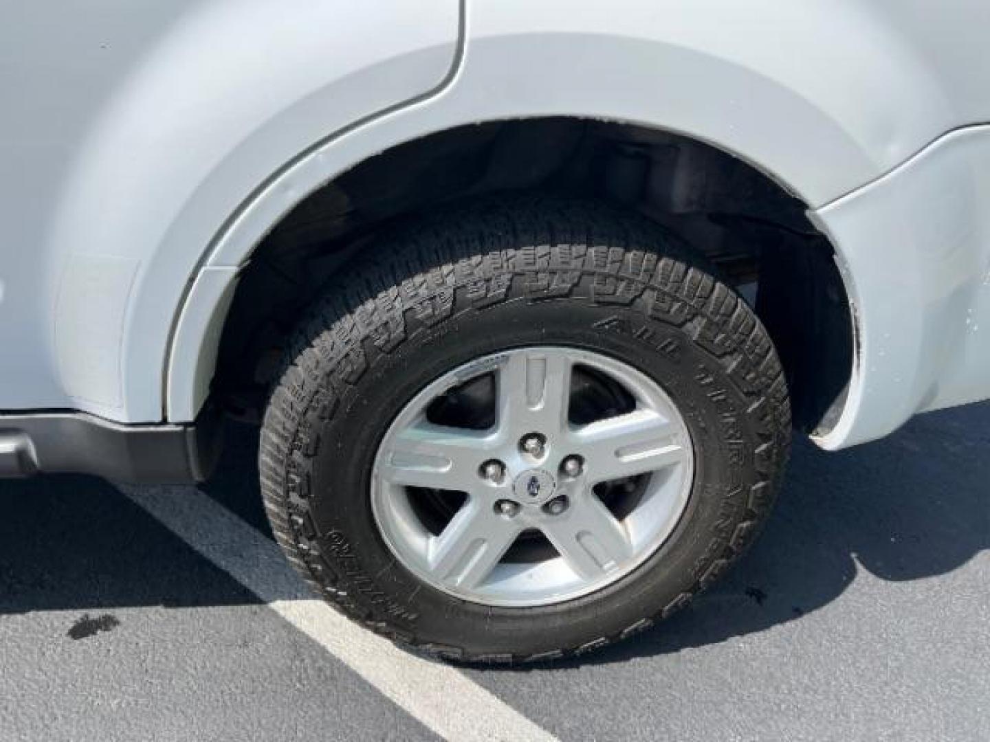2008 Oxford White /Tan Leather Interior Ford Escape Hybrid FWD (1FMCU49H98K) with an 2.3L L4 DOHC 16V HYBRID engine, Continuously Variable Transmission transmission, located at 1865 East Red Hills Pkwy, St. George, 84770, (435) 628-0023, 37.120850, -113.543640 - This vehicle is a Mechanic Special. This means it will need some love. Runs a drives fine but has body damage, leaks or other mechanical issues. It did NOT pass our 50 point inspection. Get a great deal on a less than perfect car. These cars do NOT qualify for our in house financing. Cash and carry, - Photo#12