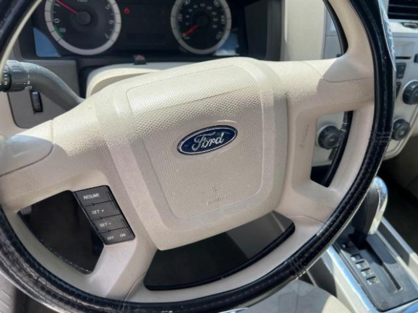 2008 Oxford White /Tan Leather Interior Ford Escape Hybrid FWD (1FMCU49H98K) with an 2.3L L4 DOHC 16V HYBRID engine, Continuously Variable Transmission transmission, located at 1865 East Red Hills Pkwy, St. George, 84770, (435) 628-0023, 37.120850, -113.543640 - This vehicle is a Mechanic Special. This means it will need some love. Runs a drives fine but has body damage, leaks or other mechanical issues. It did NOT pass our 50 point inspection. Get a great deal on a less than perfect car. These cars do NOT qualify for our in house financing. Cash and carry, - Photo#13