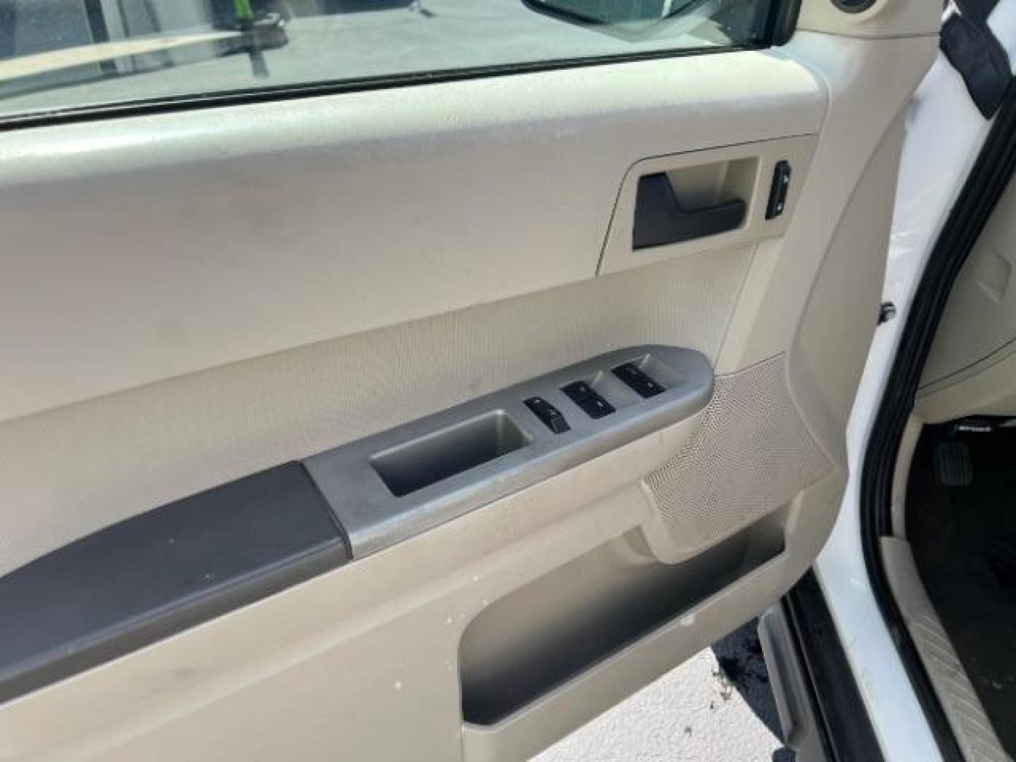 2008 Oxford White /Tan Leather Interior Ford Escape Hybrid FWD (1FMCU49H98K) with an 2.3L L4 DOHC 16V HYBRID engine, Continuously Variable Transmission transmission, located at 1865 East Red Hills Pkwy, St. George, 84770, (435) 628-0023, 37.120850, -113.543640 - This vehicle is a Mechanic Special. This means it will need some love. Runs a drives fine but has body damage, leaks or other mechanical issues. It did NOT pass our 50 point inspection. Get a great deal on a less than perfect car. These cars do NOT qualify for our in house financing. Cash and carry, - Photo#15