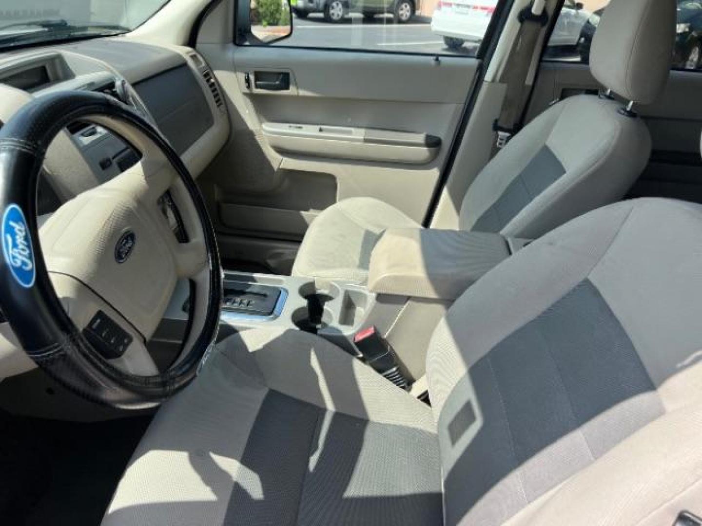 2008 Oxford White /Tan Leather Interior Ford Escape Hybrid FWD (1FMCU49H98K) with an 2.3L L4 DOHC 16V HYBRID engine, Continuously Variable Transmission transmission, located at 1865 East Red Hills Pkwy, St. George, 84770, (435) 628-0023, 37.120850, -113.543640 - This vehicle is a Mechanic Special. This means it will need some love. Runs a drives fine but has body damage, leaks or other mechanical issues. It did NOT pass our 50 point inspection. Get a great deal on a less than perfect car. These cars do NOT qualify for our in house financing. Cash and carry, - Photo#16