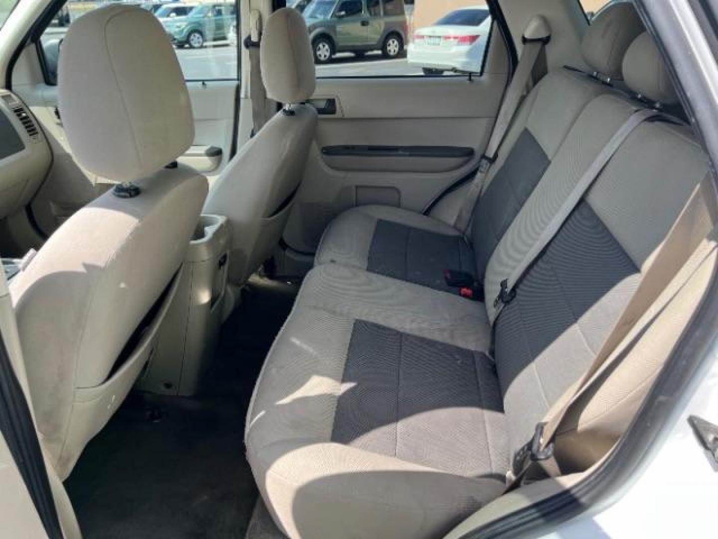 2008 Oxford White /Tan Leather Interior Ford Escape Hybrid FWD (1FMCU49H98K) with an 2.3L L4 DOHC 16V HYBRID engine, Continuously Variable Transmission transmission, located at 1865 East Red Hills Pkwy, St. George, 84770, (435) 628-0023, 37.120850, -113.543640 - This vehicle is a Mechanic Special. This means it will need some love. Runs a drives fine but has body damage, leaks or other mechanical issues. It did NOT pass our 50 point inspection. Get a great deal on a less than perfect car. These cars do NOT qualify for our in house financing. Cash and carry, - Photo#20