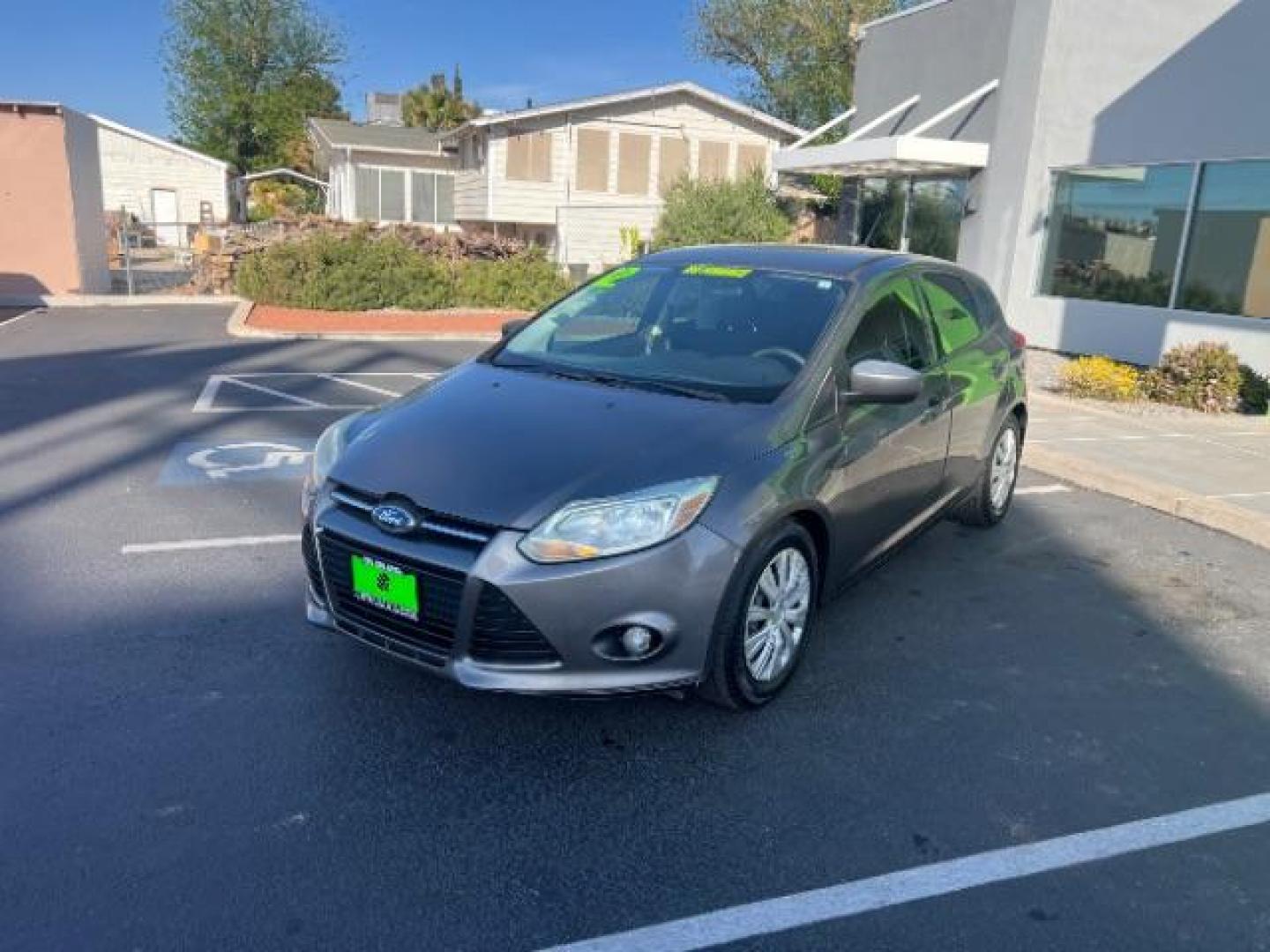 2012 Sterling Grey Metall /Charcoal Black/Metal Ford Focus SE (1FAHP3K24CL) with an 2.0L L4 DOHC 16V engine, 6-Speed Automatic transmission, located at 940 North Main Street, Cedar City, UT, 84720, (435) 628-0023, 37.692936, -113.061897 - We specialize in helping ALL people get the best financing available. No matter your credit score, good, bad or none we can get you an amazing rate. Had a bankruptcy, divorce, or repossessions? We give you the green light to get your credit back on the road. Low down and affordable payments that fit - Photo#2
