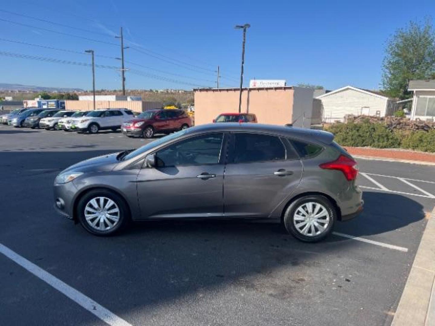 2012 Sterling Grey Metall /Charcoal Black/Metal Ford Focus SE (1FAHP3K24CL) with an 2.0L L4 DOHC 16V engine, 6-Speed Automatic transmission, located at 940 North Main Street, Cedar City, UT, 84720, (435) 628-0023, 37.692936, -113.061897 - We specialize in helping ALL people get the best financing available. No matter your credit score, good, bad or none we can get you an amazing rate. Had a bankruptcy, divorce, or repossessions? We give you the green light to get your credit back on the road. Low down and affordable payments that fit - Photo#3
