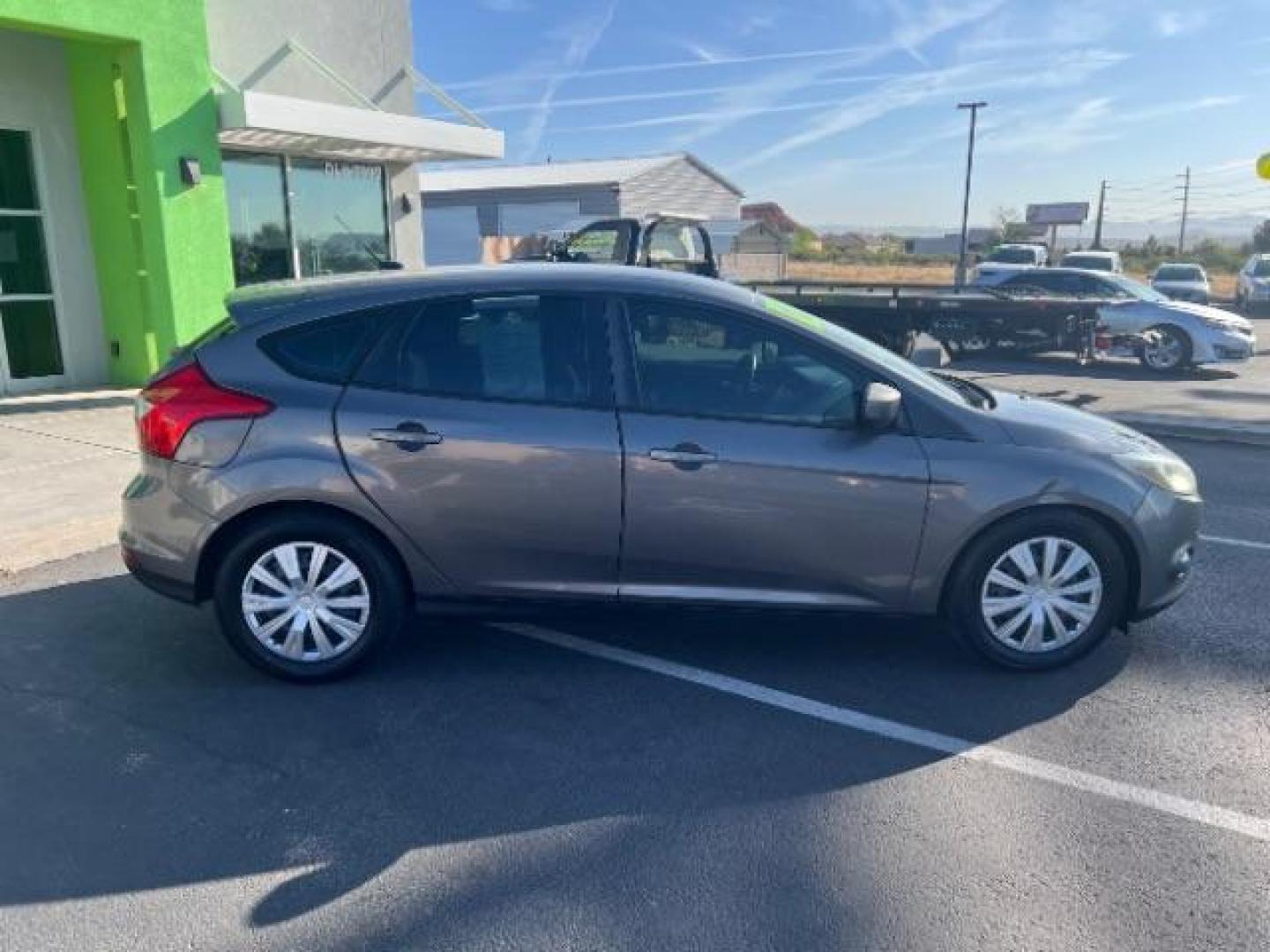2012 Sterling Grey Metall /Charcoal Black/Metal Ford Focus SE (1FAHP3K24CL) with an 2.0L L4 DOHC 16V engine, 6-Speed Automatic transmission, located at 940 North Main Street, Cedar City, UT, 84720, (435) 628-0023, 37.692936, -113.061897 - We specialize in helping ALL people get the best financing available. No matter your credit score, good, bad or none we can get you an amazing rate. Had a bankruptcy, divorce, or repossessions? We give you the green light to get your credit back on the road. Low down and affordable payments that fit - Photo#7