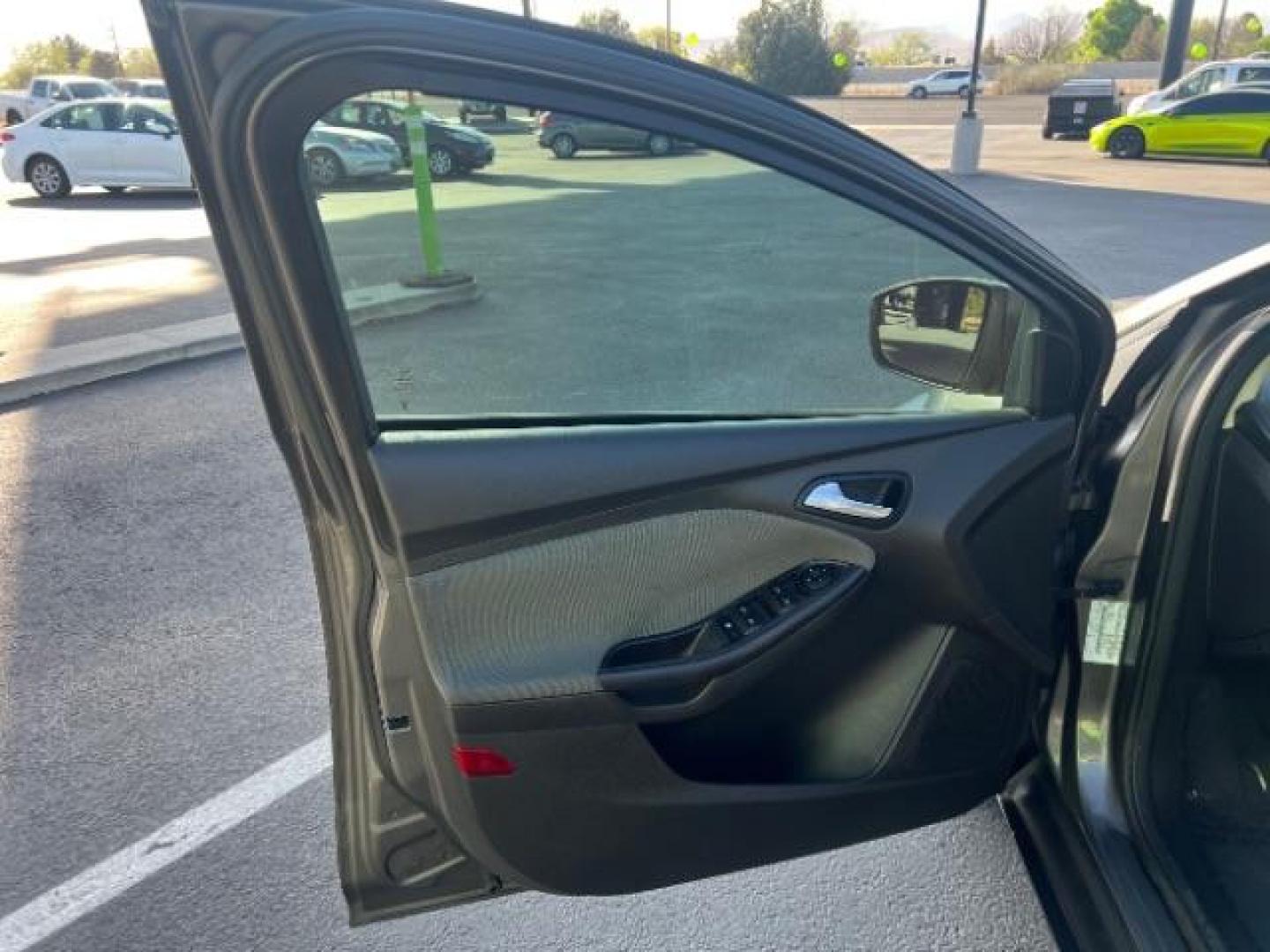 2012 Sterling Grey Metall /Charcoal Black/Metal Ford Focus SE (1FAHP3K24CL) with an 2.0L L4 DOHC 16V engine, 6-Speed Automatic transmission, located at 940 North Main Street, Cedar City, UT, 84720, (435) 628-0023, 37.692936, -113.061897 - We specialize in helping ALL people get the best financing available. No matter your credit score, good, bad or none we can get you an amazing rate. Had a bankruptcy, divorce, or repossessions? We give you the green light to get your credit back on the road. Low down and affordable payments that fit - Photo#12