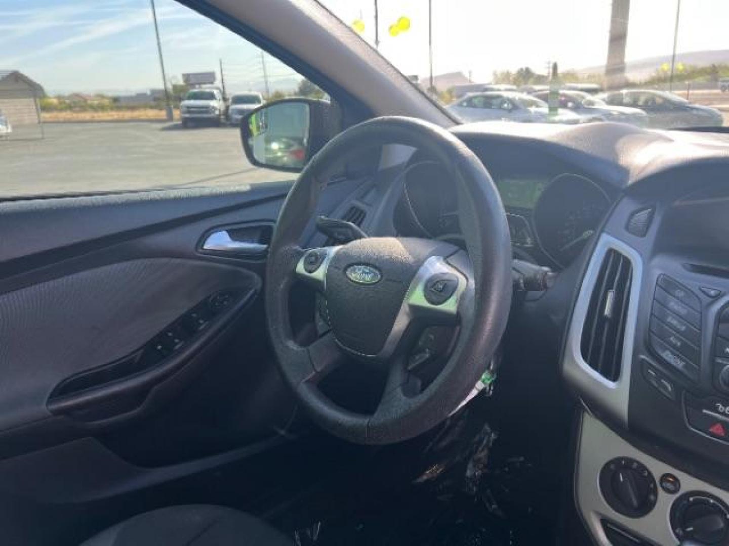 2012 Sterling Grey Metall /Charcoal Black/Metal Ford Focus SE (1FAHP3K24CL) with an 2.0L L4 DOHC 16V engine, 6-Speed Automatic transmission, located at 940 North Main Street, Cedar City, UT, 84720, (435) 628-0023, 37.692936, -113.061897 - We specialize in helping ALL people get the best financing available. No matter your credit score, good, bad or none we can get you an amazing rate. Had a bankruptcy, divorce, or repossessions? We give you the green light to get your credit back on the road. Low down and affordable payments that fit - Photo#31