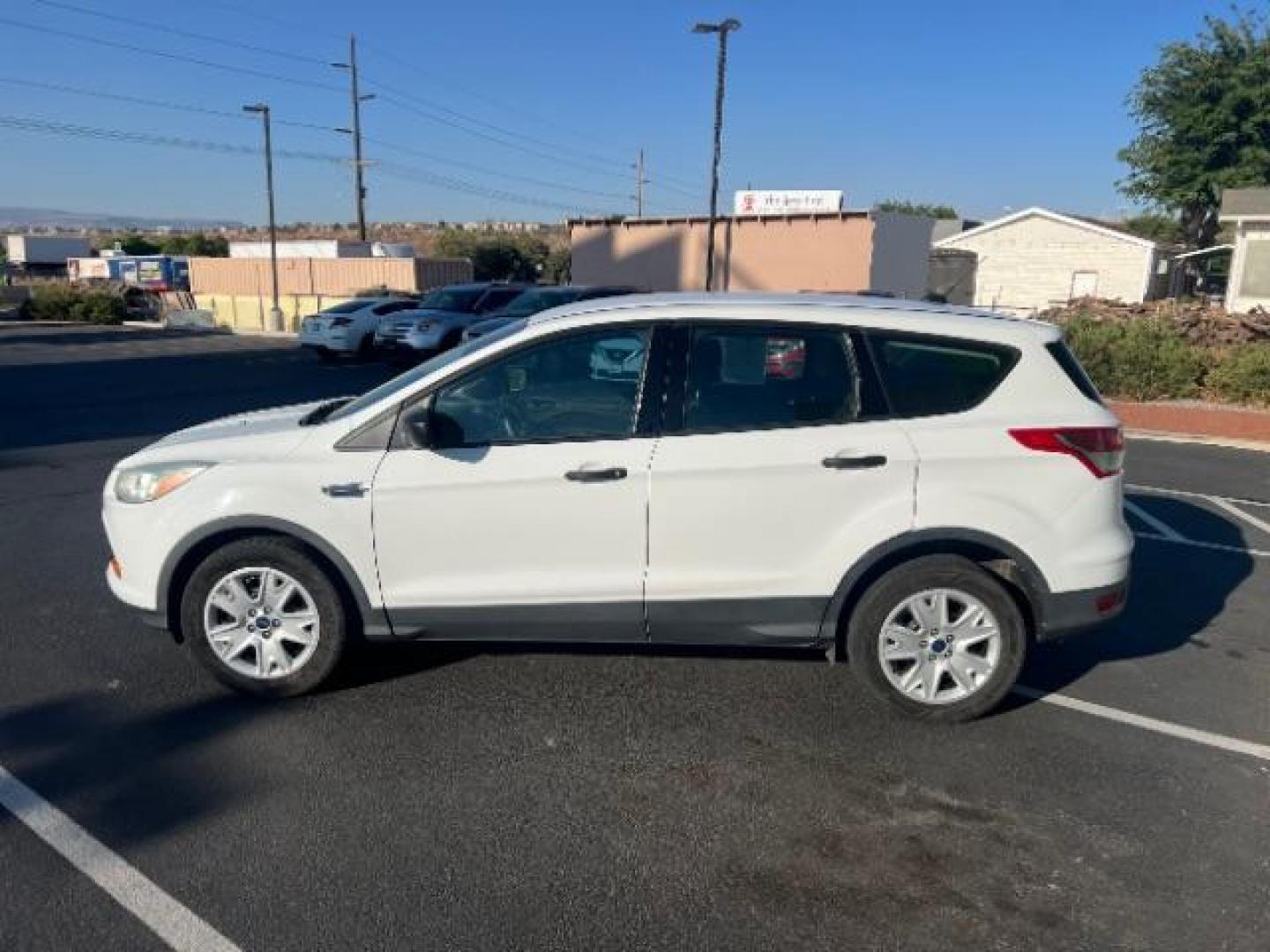 2015 Oxford White /Charcoal Black Ford Escape S FWD (1FMCU0F75FU) with an 2.5L L4 DOHC 16V engine, 6-Speed Automatic transmission, located at 1865 East Red Hills Pkwy, St. George, 84770, (435) 628-0023, 37.120850, -113.543640 - We specialize in helping ALL people get the best financing available. No matter your credit score, good, bad or none we can get you an amazing rate. Had a bankruptcy, divorce, or repossessions? We give you the green light to get your credit back on the road. Low down and affordable payments that fit - Photo#3
