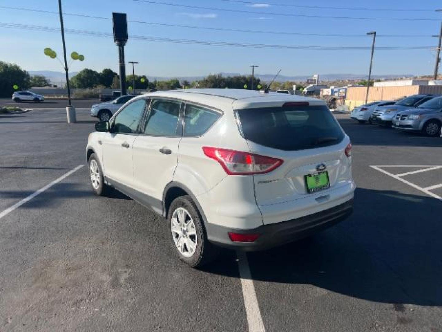 2015 Oxford White /Charcoal Black Ford Escape S FWD (1FMCU0F75FU) with an 2.5L L4 DOHC 16V engine, 6-Speed Automatic transmission, located at 1865 East Red Hills Pkwy, St. George, 84770, (435) 628-0023, 37.120850, -113.543640 - We specialize in helping ALL people get the best financing available. No matter your credit score, good, bad or none we can get you an amazing rate. Had a bankruptcy, divorce, or repossessions? We give you the green light to get your credit back on the road. Low down and affordable payments that fit - Photo#4