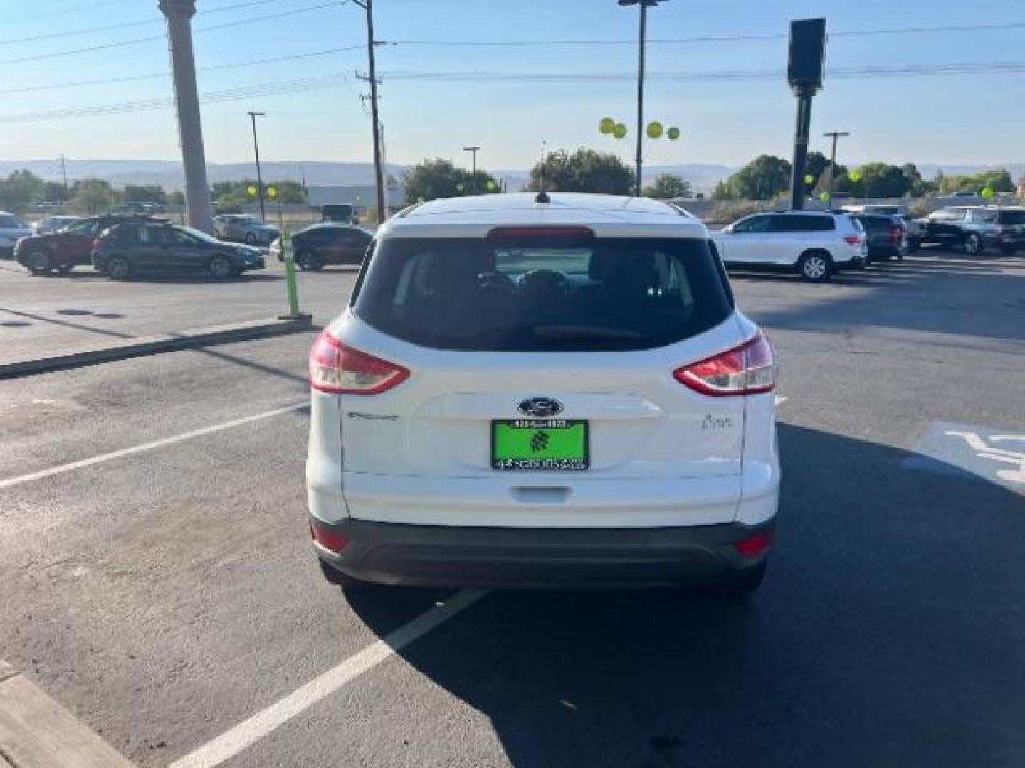2015 Oxford White /Charcoal Black Ford Escape S FWD (1FMCU0F75FU) with an 2.5L L4 DOHC 16V engine, 6-Speed Automatic transmission, located at 1865 East Red Hills Pkwy, St. George, 84770, (435) 628-0023, 37.120850, -113.543640 - We specialize in helping ALL people get the best financing available. No matter your credit score, good, bad or none we can get you an amazing rate. Had a bankruptcy, divorce, or repossessions? We give you the green light to get your credit back on the road. Low down and affordable payments that fit - Photo#5