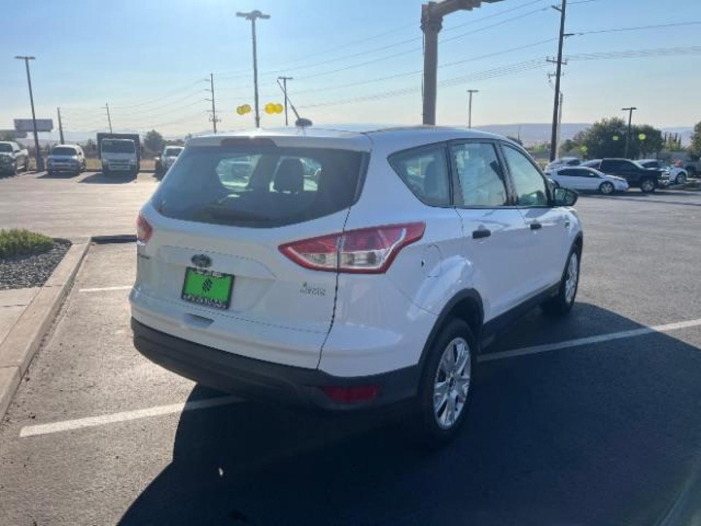 2015 Oxford White /Charcoal Black Ford Escape S FWD (1FMCU0F75FU) with an 2.5L L4 DOHC 16V engine, 6-Speed Automatic transmission, located at 1865 East Red Hills Pkwy, St. George, 84770, (435) 628-0023, 37.120850, -113.543640 - We specialize in helping ALL people get the best financing available. No matter your credit score, good, bad or none we can get you an amazing rate. Had a bankruptcy, divorce, or repossessions? We give you the green light to get your credit back on the road. Low down and affordable payments that fit - Photo#6