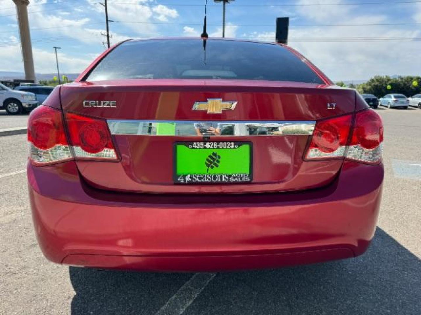 2013 Crystal Red Tintcoat /Jet Black Cloth Interior Chevrolet Cruze 1LT Auto (1G1PC5SB4D7) with an 1.4L L4 DOHC 16V TUR engine, 6-Speed Automatic transmission, located at 1865 East Red Hills Pkwy, St. George, 84770, (435) 628-0023, 37.120850, -113.543640 - We specialize in helping ALL people get the best financing available. No matter your credit score, good, bad or none we can get you an amazing rate. Had a bankruptcy, divorce, or repossessions? We give you the green light to get your credit back on the road. Low down and affordable payments that fit - Photo#5
