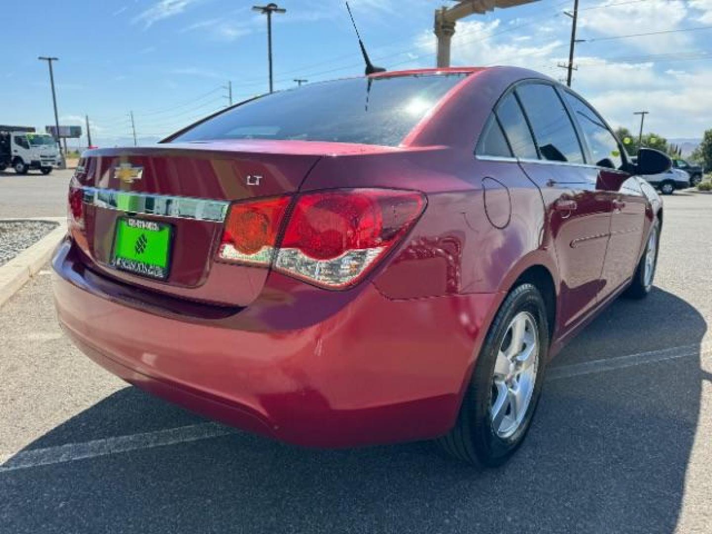 2013 Crystal Red Tintcoat /Jet Black Cloth Interior Chevrolet Cruze 1LT Auto (1G1PC5SB4D7) with an 1.4L L4 DOHC 16V TUR engine, 6-Speed Automatic transmission, located at 1865 East Red Hills Pkwy, St. George, 84770, (435) 628-0023, 37.120850, -113.543640 - We specialize in helping ALL people get the best financing available. No matter your credit score, good, bad or none we can get you an amazing rate. Had a bankruptcy, divorce, or repossessions? We give you the green light to get your credit back on the road. Low down and affordable payments that fit - Photo#6