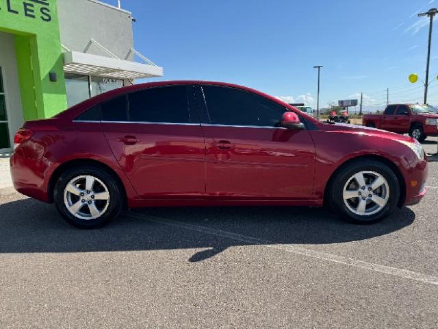 2013 Crystal Red Tintcoat /Jet Black Cloth Interior Chevrolet Cruze 1LT Auto (1G1PC5SB4D7) with an 1.4L L4 DOHC 16V TUR engine, 6-Speed Automatic transmission, located at 1865 East Red Hills Pkwy, St. George, 84770, (435) 628-0023, 37.120850, -113.543640 - We specialize in helping ALL people get the best financing available. No matter your credit score, good, bad or none we can get you an amazing rate. Had a bankruptcy, divorce, or repossessions? We give you the green light to get your credit back on the road. Low down and affordable payments that fit - Photo#7