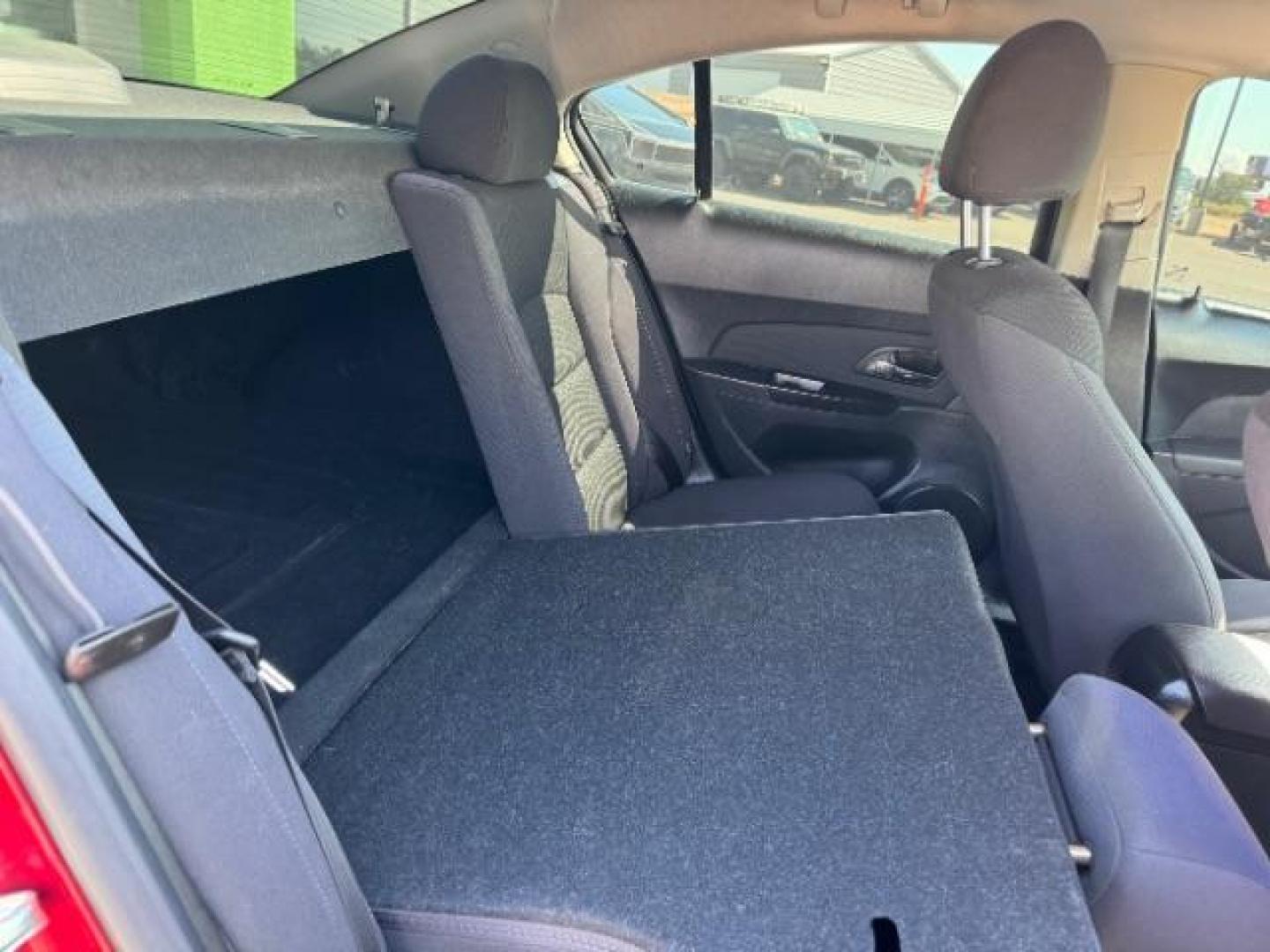 2013 Crystal Red Tintcoat /Jet Black Cloth Interior Chevrolet Cruze 1LT Auto (1G1PC5SB4D7) with an 1.4L L4 DOHC 16V TUR engine, 6-Speed Automatic transmission, located at 1865 East Red Hills Pkwy, St. George, 84770, (435) 628-0023, 37.120850, -113.543640 - We specialize in helping ALL people get the best financing available. No matter your credit score, good, bad or none we can get you an amazing rate. Had a bankruptcy, divorce, or repossessions? We give you the green light to get your credit back on the road. Low down and affordable payments that fit - Photo#31
