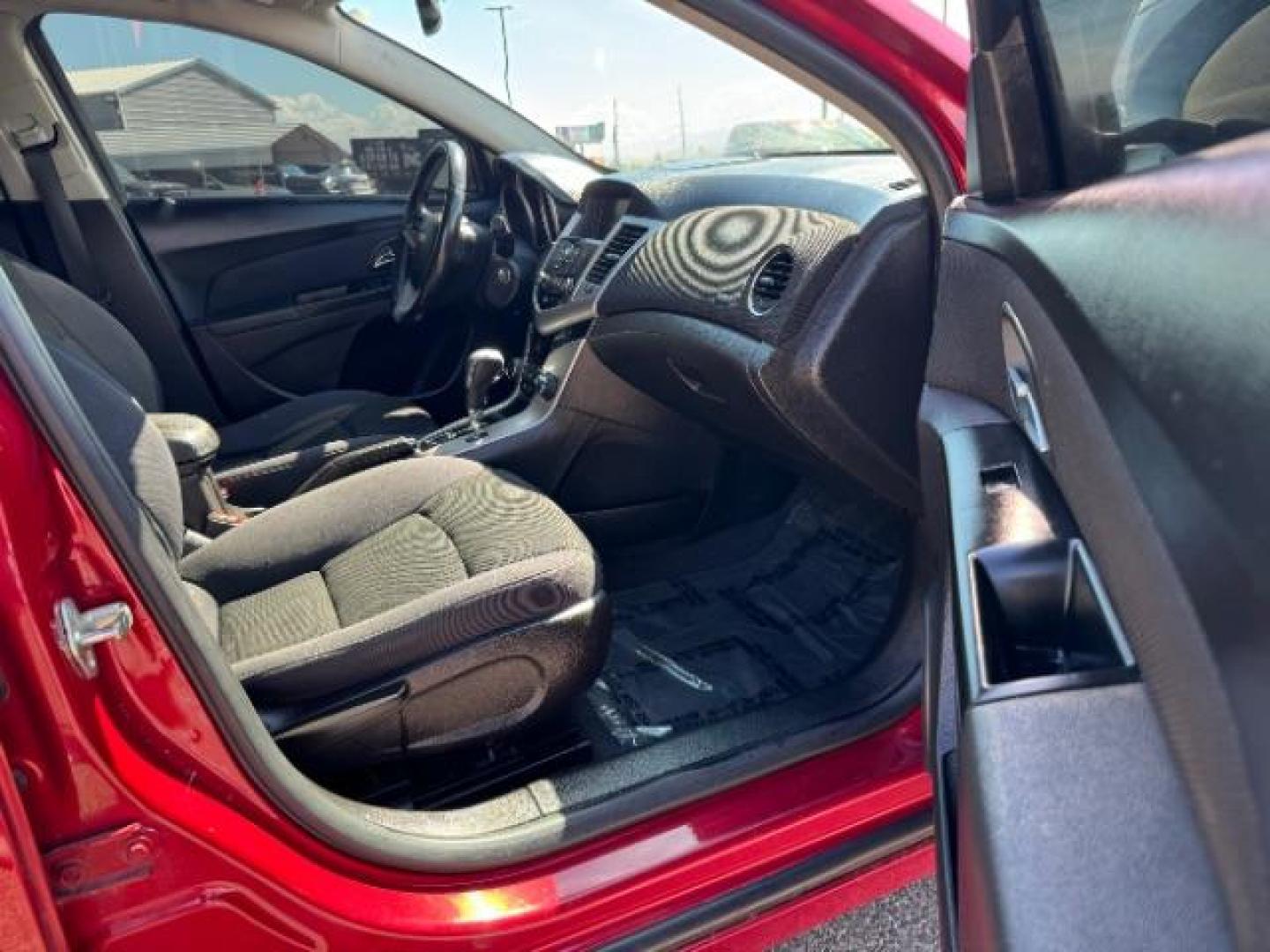 2013 Crystal Red Tintcoat /Jet Black Cloth Interior Chevrolet Cruze 1LT Auto (1G1PC5SB4D7) with an 1.4L L4 DOHC 16V TUR engine, 6-Speed Automatic transmission, located at 1865 East Red Hills Pkwy, St. George, 84770, (435) 628-0023, 37.120850, -113.543640 - We specialize in helping ALL people get the best financing available. No matter your credit score, good, bad or none we can get you an amazing rate. Had a bankruptcy, divorce, or repossessions? We give you the green light to get your credit back on the road. Low down and affordable payments that fit - Photo#32
