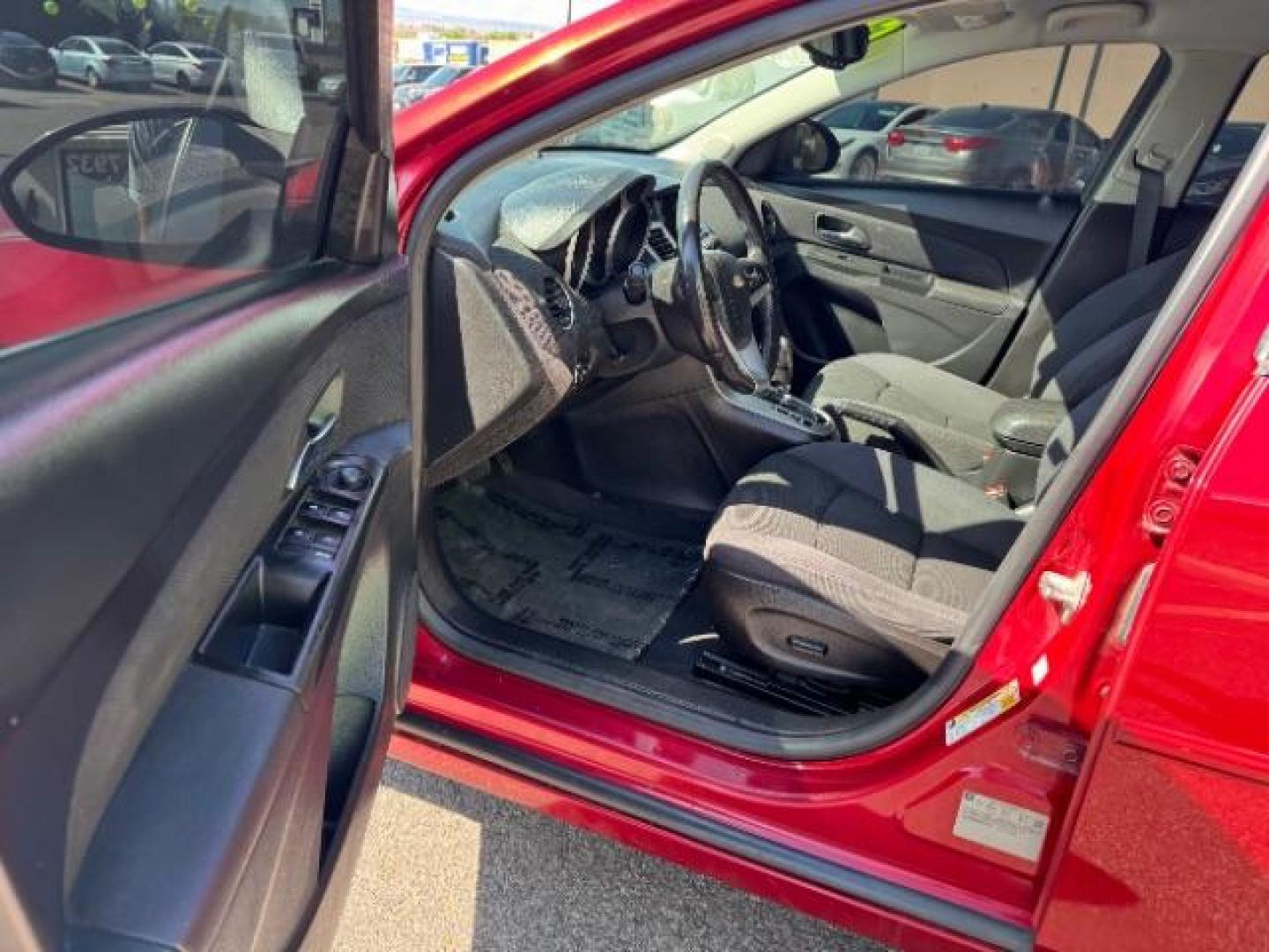 2013 Crystal Red Tintcoat /Jet Black Cloth Interior Chevrolet Cruze 1LT Auto (1G1PC5SB4D7) with an 1.4L L4 DOHC 16V TUR engine, 6-Speed Automatic transmission, located at 1865 East Red Hills Pkwy, St. George, 84770, (435) 628-0023, 37.120850, -113.543640 - We specialize in helping ALL people get the best financing available. No matter your credit score, good, bad or none we can get you an amazing rate. Had a bankruptcy, divorce, or repossessions? We give you the green light to get your credit back on the road. Low down and affordable payments that fit - Photo#12