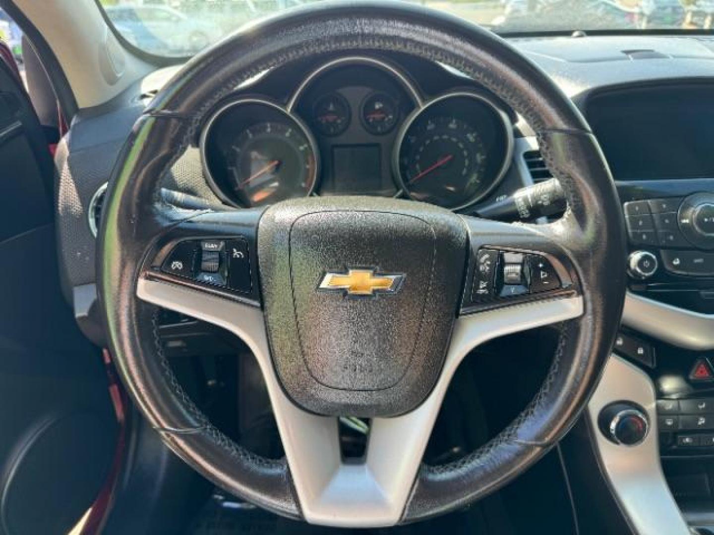 2013 Crystal Red Tintcoat /Jet Black Cloth Interior Chevrolet Cruze 1LT Auto (1G1PC5SB4D7) with an 1.4L L4 DOHC 16V TUR engine, 6-Speed Automatic transmission, located at 1865 East Red Hills Pkwy, St. George, 84770, (435) 628-0023, 37.120850, -113.543640 - We specialize in helping ALL people get the best financing available. No matter your credit score, good, bad or none we can get you an amazing rate. Had a bankruptcy, divorce, or repossessions? We give you the green light to get your credit back on the road. Low down and affordable payments that fit - Photo#16