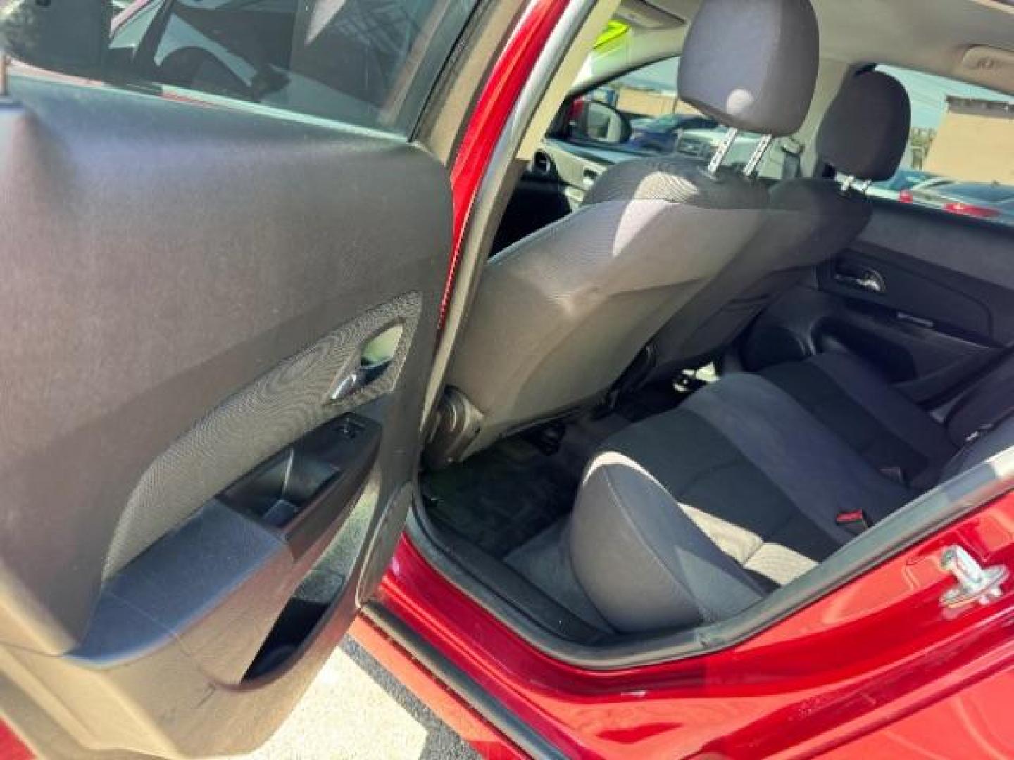 2013 Crystal Red Tintcoat /Jet Black Cloth Interior Chevrolet Cruze 1LT Auto (1G1PC5SB4D7) with an 1.4L L4 DOHC 16V TUR engine, 6-Speed Automatic transmission, located at 1865 East Red Hills Pkwy, St. George, 84770, (435) 628-0023, 37.120850, -113.543640 - We specialize in helping ALL people get the best financing available. No matter your credit score, good, bad or none we can get you an amazing rate. Had a bankruptcy, divorce, or repossessions? We give you the green light to get your credit back on the road. Low down and affordable payments that fit - Photo#22
