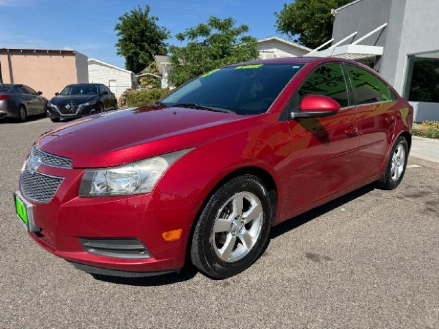 2013 Crystal Red Tintcoat /Jet Black Cloth Interior Chevrolet Cruze 1LT Auto (1G1PC5SB4D7) with an 1.4L L4 DOHC 16V TUR engine, 6-Speed Automatic transmission, located at 1865 East Red Hills Pkwy, St. George, 84770, (435) 628-0023, 37.120850, -113.543640 - We specialize in helping ALL people get the best financing available. No matter your credit score, good, bad or none we can get you an amazing rate. Had a bankruptcy, divorce, or repossessions? We give you the green light to get your credit back on the road. Low down and affordable payments that fit - Photo#2