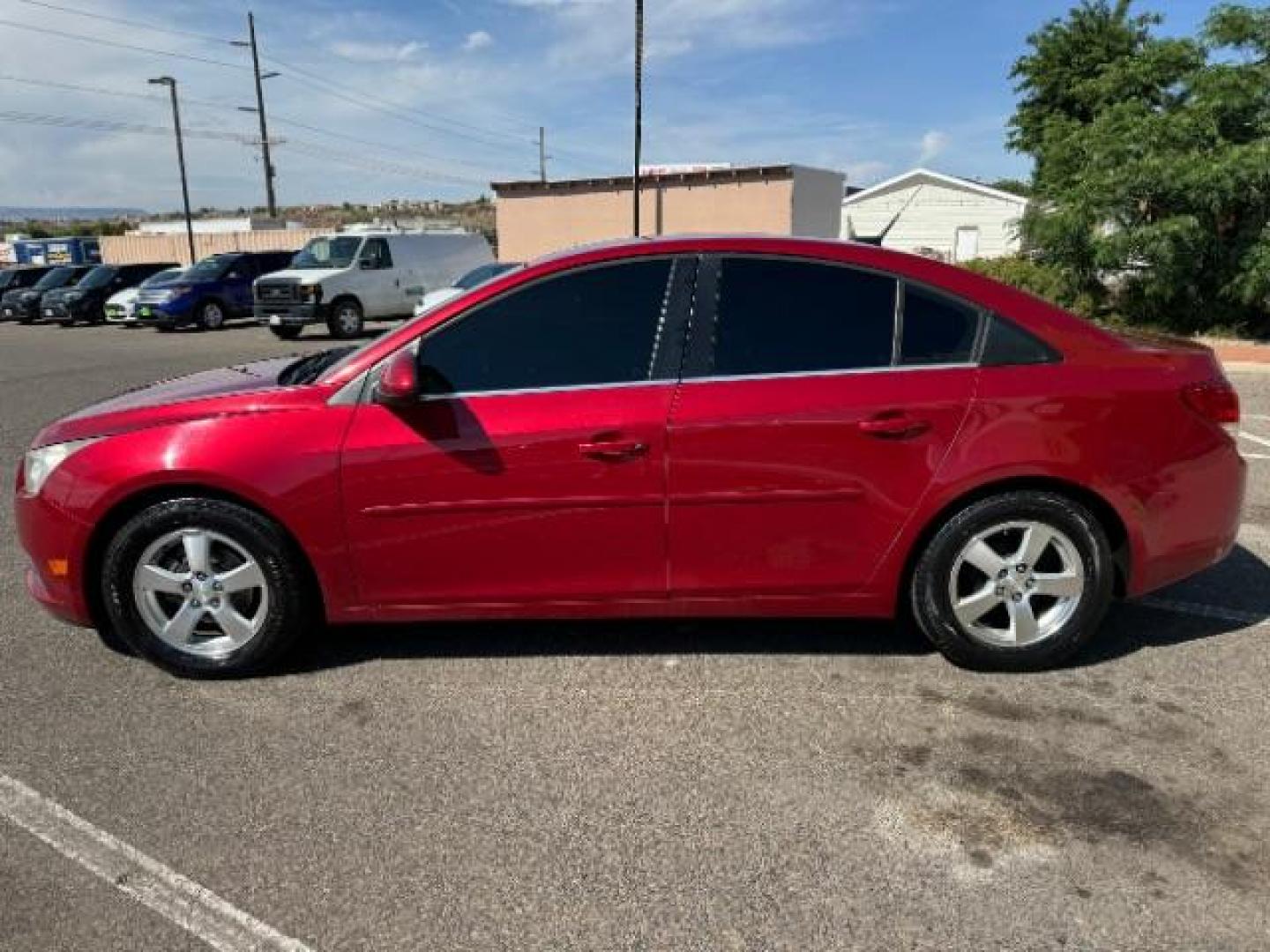 2013 Crystal Red Tintcoat /Jet Black Cloth Interior Chevrolet Cruze 1LT Auto (1G1PC5SB4D7) with an 1.4L L4 DOHC 16V TUR engine, 6-Speed Automatic transmission, located at 1865 East Red Hills Pkwy, St. George, 84770, (435) 628-0023, 37.120850, -113.543640 - We specialize in helping ALL people get the best financing available. No matter your credit score, good, bad or none we can get you an amazing rate. Had a bankruptcy, divorce, or repossessions? We give you the green light to get your credit back on the road. Low down and affordable payments that fit - Photo#3