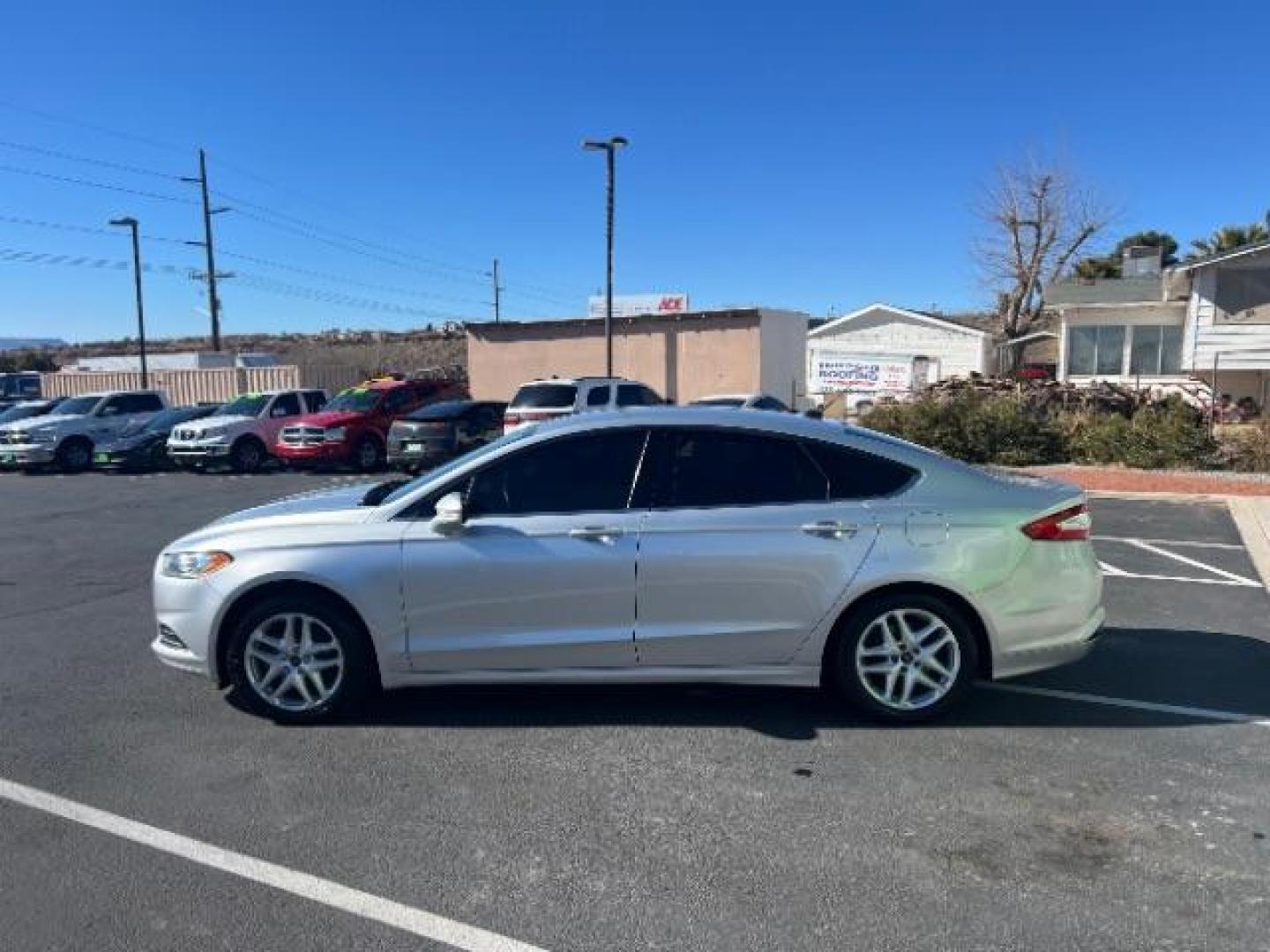 2016 Silver /Charcoal Black, clot Ford Fusion SE (3FA6P0HD0GR) with an 1.5L L4 DOHC 16V engine, 6-Speed Automatic transmission, located at 940 North Main Street, Cedar City, UT, 84720, (435) 628-0023, 37.692936, -113.061897 - We specialize in helping ALL people get the best financing available. No matter your credit score, good, bad or none we can get you an amazing rate. Had a bankruptcy, divorce, or repossessions? We give you the green light to get your credit back on the road. Low down and affordable payments that fit - Photo#3