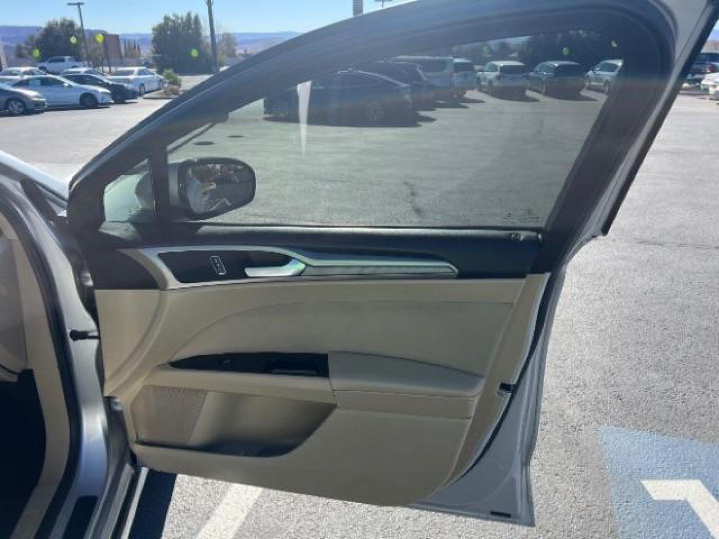 2016 Silver /Charcoal Black, clot Ford Fusion SE (3FA6P0HD0GR) with an 1.5L L4 DOHC 16V engine, 6-Speed Automatic transmission, located at 940 North Main Street, Cedar City, UT, 84720, (435) 628-0023, 37.692936, -113.061897 - We specialize in helping ALL people get the best financing available. No matter your credit score, good, bad or none we can get you an amazing rate. Had a bankruptcy, divorce, or repossessions? We give you the green light to get your credit back on the road. Low down and affordable payments that fit - Photo#28