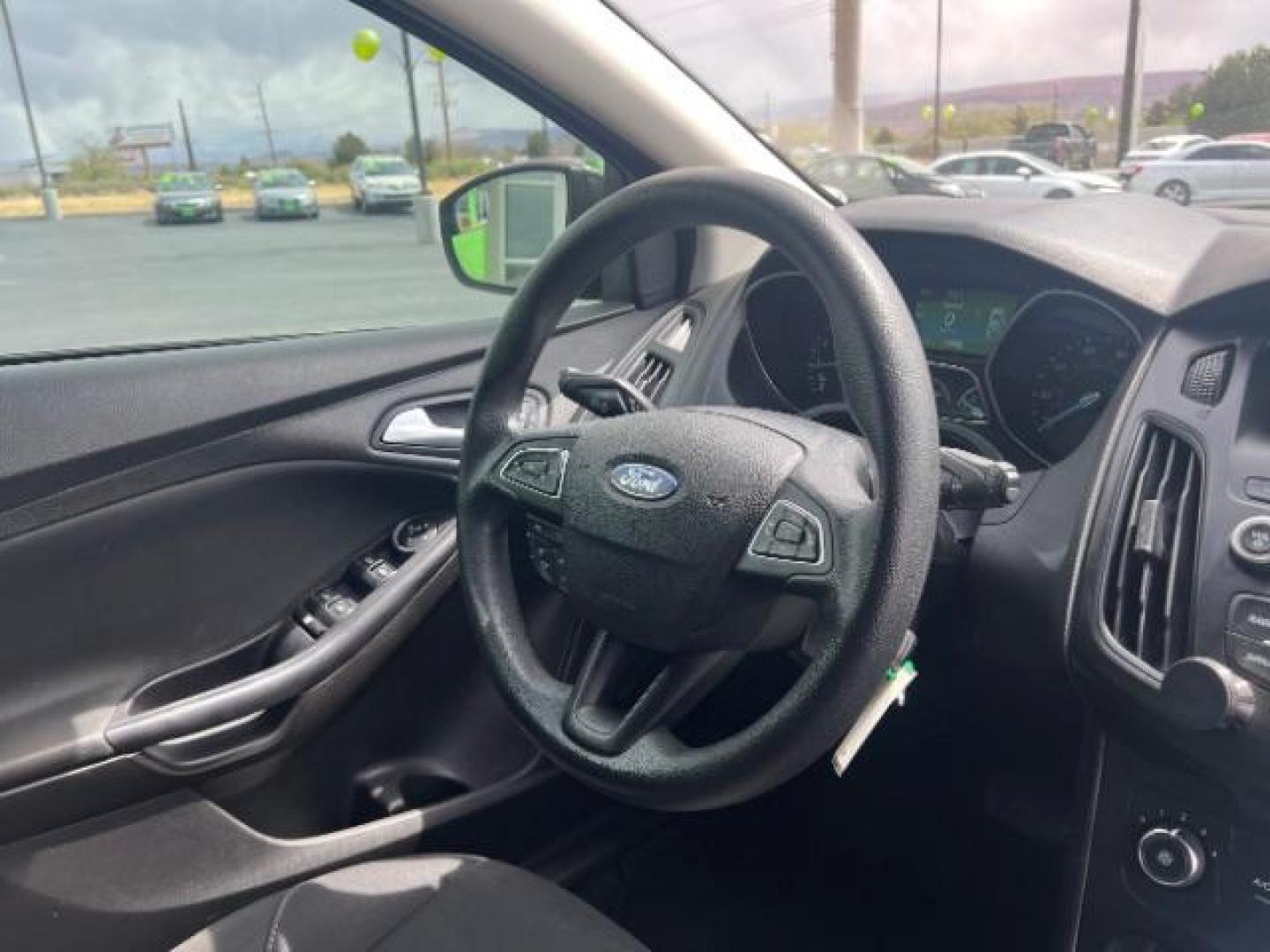 2016 Magnetic Metallic /Charcoal Black Insert w/Warm Steel Surround, cloth Ford Focus SE Hatch (1FADP3K28GL) with an 2.0L L4 DOHC 16V engine, 6-Speed Automatic transmission, located at 1865 East Red Hills Pkwy, St. George, 84770, (435) 628-0023, 37.120850, -113.543640 - We specialize in helping ALL people get the best financing available. No matter your credit score, good, bad or none we can get you an amazing rate. Had a bankruptcy, divorce, or repossessions? We give you the green light to get your credit back on the road. Low down and affordable payments that fit - Photo#29