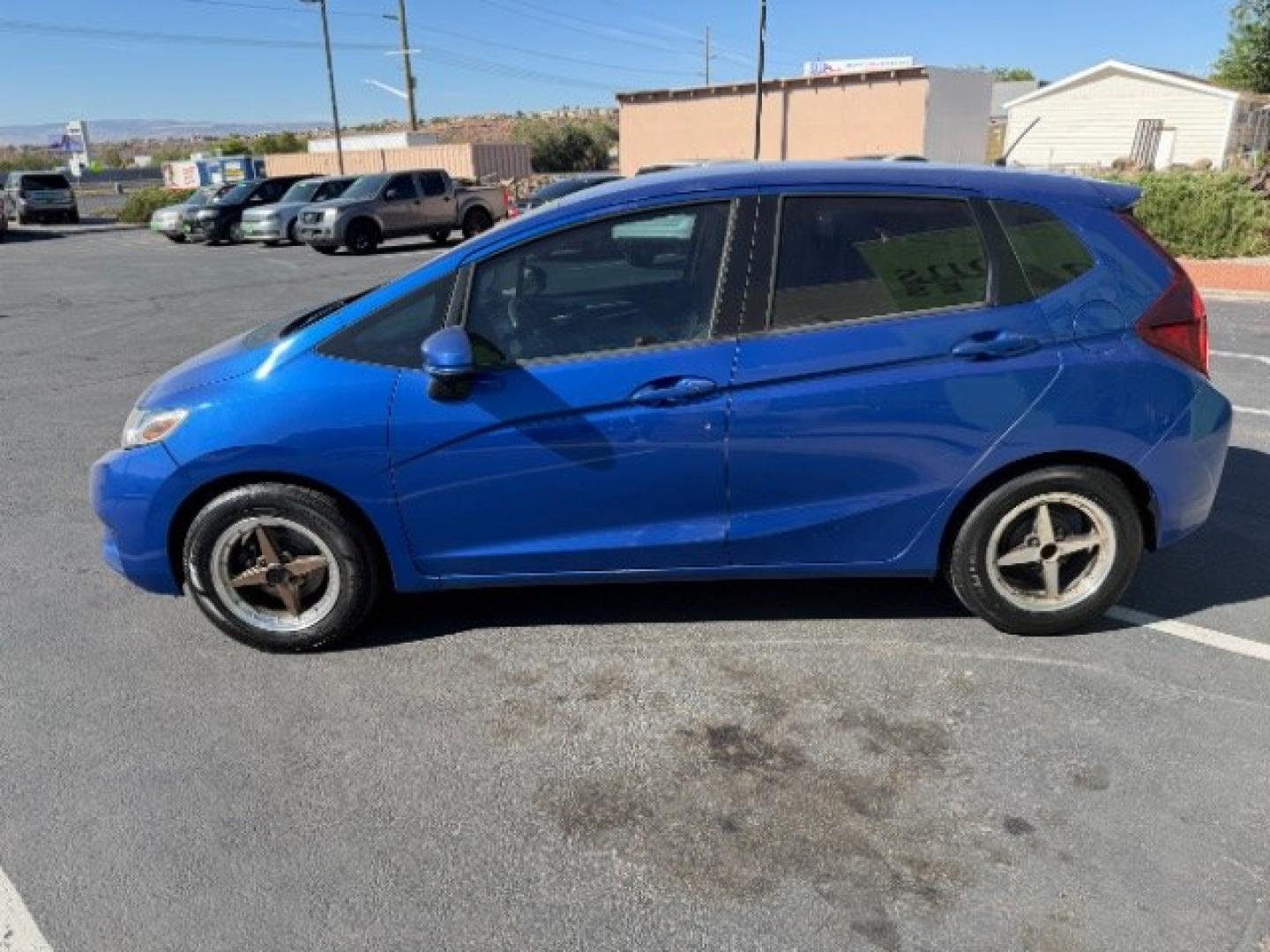 2015 Aegean Blue Metallic /Black Honda Fit LX 6-Spd MT (3HGGK5G59FM) with an 1.5L L4 SOHC 16V engine, 6-Speed Manual transmission, located at 1865 East Red Hills Pkwy, St. George, 84770, (435) 628-0023, 37.120850, -113.543640 - We specialize in helping ALL people get the best financing available. No matter your credit score, good, bad or none we can get you an amazing rate. Had a bankruptcy, divorce, or repossessions? We give you the green light to get your credit back on the road. Low down and affordable payments that fit- Photo#3