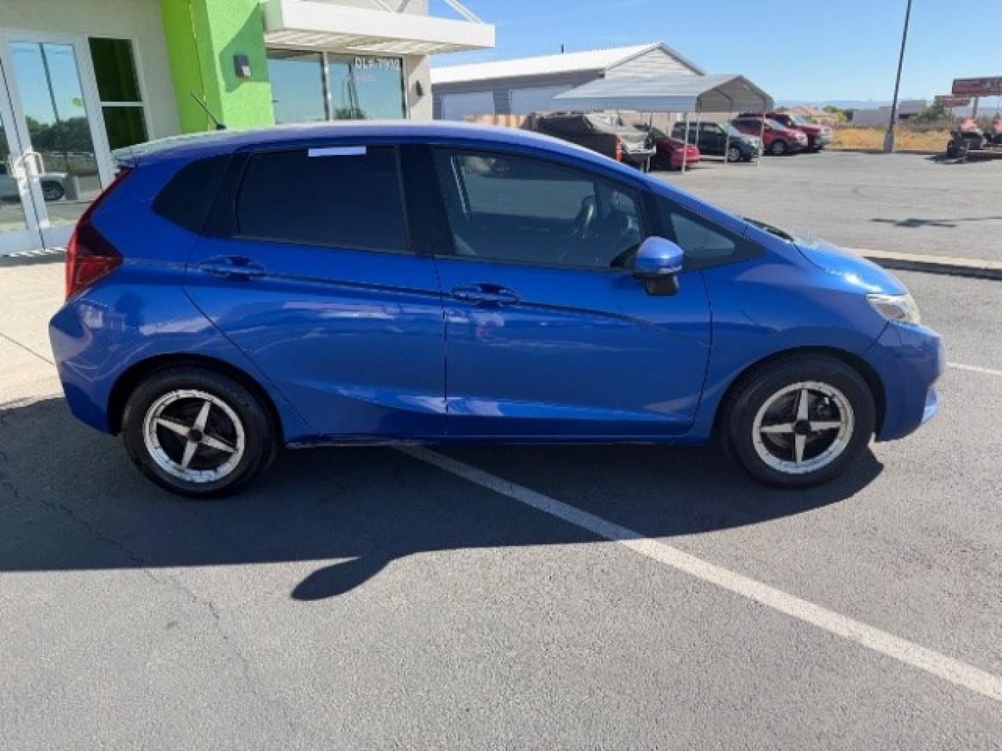 2015 Aegean Blue Metallic /Black Honda Fit LX 6-Spd MT (3HGGK5G59FM) with an 1.5L L4 SOHC 16V engine, 6-Speed Manual transmission, located at 1865 East Red Hills Pkwy, St. George, 84770, (435) 628-0023, 37.120850, -113.543640 - We specialize in helping ALL people get the best financing available. No matter your credit score, good, bad or none we can get you an amazing rate. Had a bankruptcy, divorce, or repossessions? We give you the green light to get your credit back on the road. Low down and affordable payments that fit- Photo#9