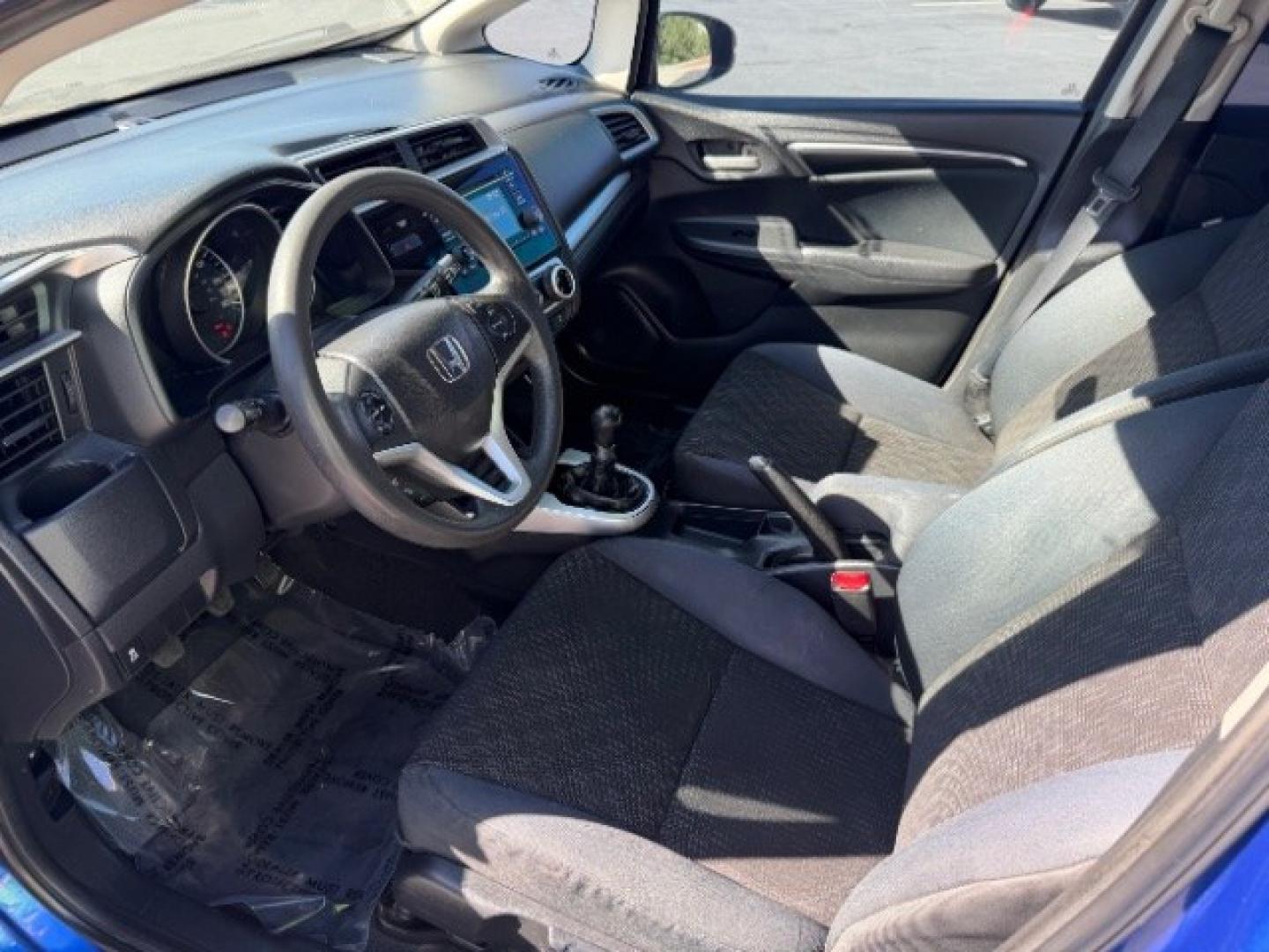 2015 Aegean Blue Metallic /Black Honda Fit LX 6-Spd MT (3HGGK5G59FM) with an 1.5L L4 SOHC 16V engine, 6-Speed Manual transmission, located at 1865 East Red Hills Pkwy, St. George, 84770, (435) 628-0023, 37.120850, -113.543640 - We specialize in helping ALL people get the best financing available. No matter your credit score, good, bad or none we can get you an amazing rate. Had a bankruptcy, divorce, or repossessions? We give you the green light to get your credit back on the road. Low down and affordable payments that fit- Photo#14
