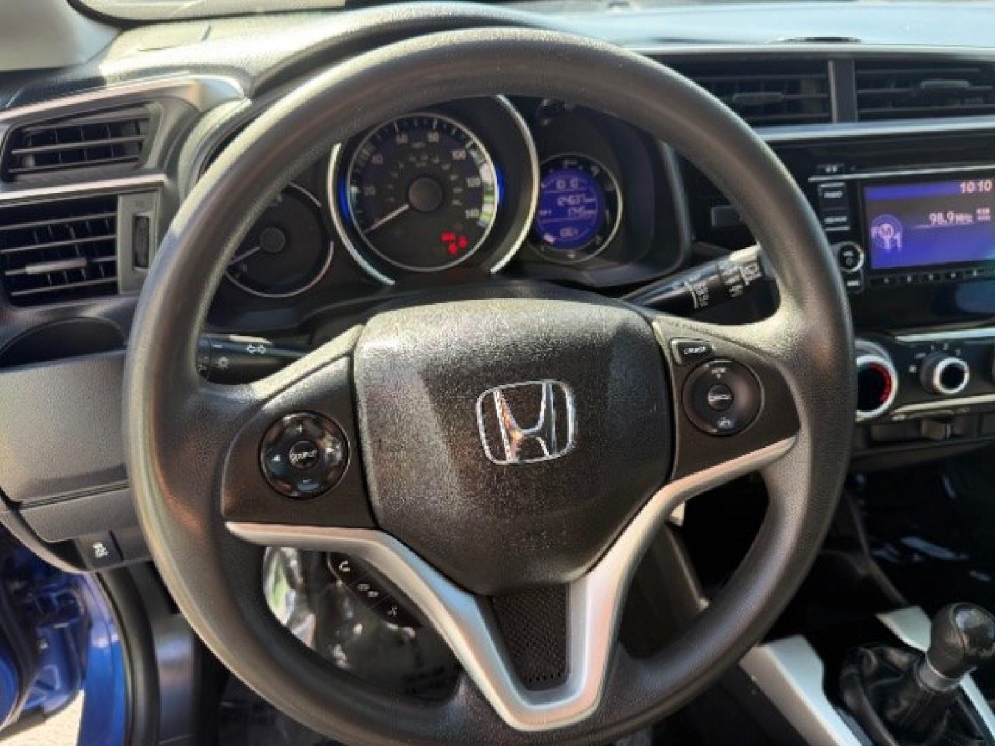 2015 Aegean Blue Metallic /Black Honda Fit LX 6-Spd MT (3HGGK5G59FM) with an 1.5L L4 SOHC 16V engine, 6-Speed Manual transmission, located at 1865 East Red Hills Pkwy, St. George, 84770, (435) 628-0023, 37.120850, -113.543640 - We specialize in helping ALL people get the best financing available. No matter your credit score, good, bad or none we can get you an amazing rate. Had a bankruptcy, divorce, or repossessions? We give you the green light to get your credit back on the road. Low down and affordable payments that fit- Photo#17
