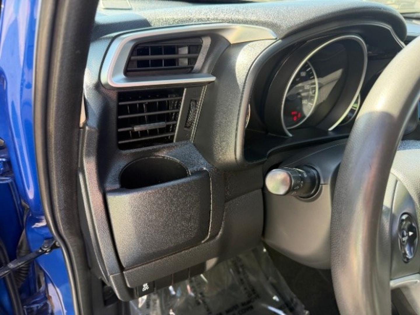 2015 Aegean Blue Metallic /Black Honda Fit LX 6-Spd MT (3HGGK5G59FM) with an 1.5L L4 SOHC 16V engine, 6-Speed Manual transmission, located at 1865 East Red Hills Pkwy, St. George, 84770, (435) 628-0023, 37.120850, -113.543640 - We specialize in helping ALL people get the best financing available. No matter your credit score, good, bad or none we can get you an amazing rate. Had a bankruptcy, divorce, or repossessions? We give you the green light to get your credit back on the road. Low down and affordable payments that fit- Photo#18