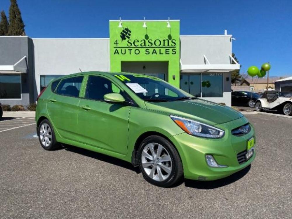 2014 Electrolyte Green Pearl /Black Hyundai Accent SE 5-Door (KMHCU5AE7EU) with an 1.6L L4 DOHC 16V engine, 5-Speed Manual transmission, located at 1865 East Red Hills Pkwy, St. George, 84770, (435) 628-0023, 37.120850, -113.543640 - Photo #0