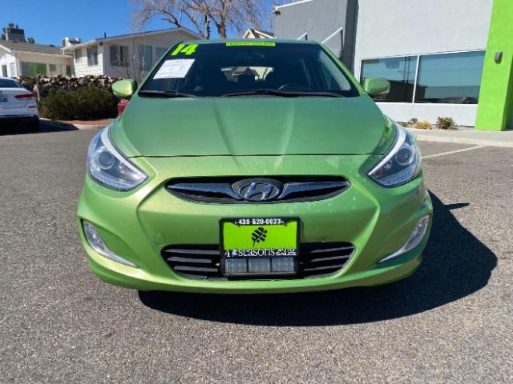 2014 Electrolyte Green Pearl /Black Hyundai Accent SE 5-Door (KMHCU5AE7EU) with an 1.6L L4 DOHC 16V engine, 5-Speed Manual transmission, located at 1865 East Red Hills Pkwy, St. George, 84770, (435) 628-0023, 37.120850, -113.543640 - Photo #1