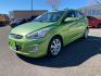 2014 Electrolyte Green Pearl /Black Hyundai Accent SE 5-Door (KMHCU5AE7EU) with an 1.6L L4 DOHC 16V engine, 5-Speed Manual transmission, located at 1865 East Red Hills Pkwy, St. George, 84770, (435) 628-0023, 37.120850, -113.543640 - Photo #2
