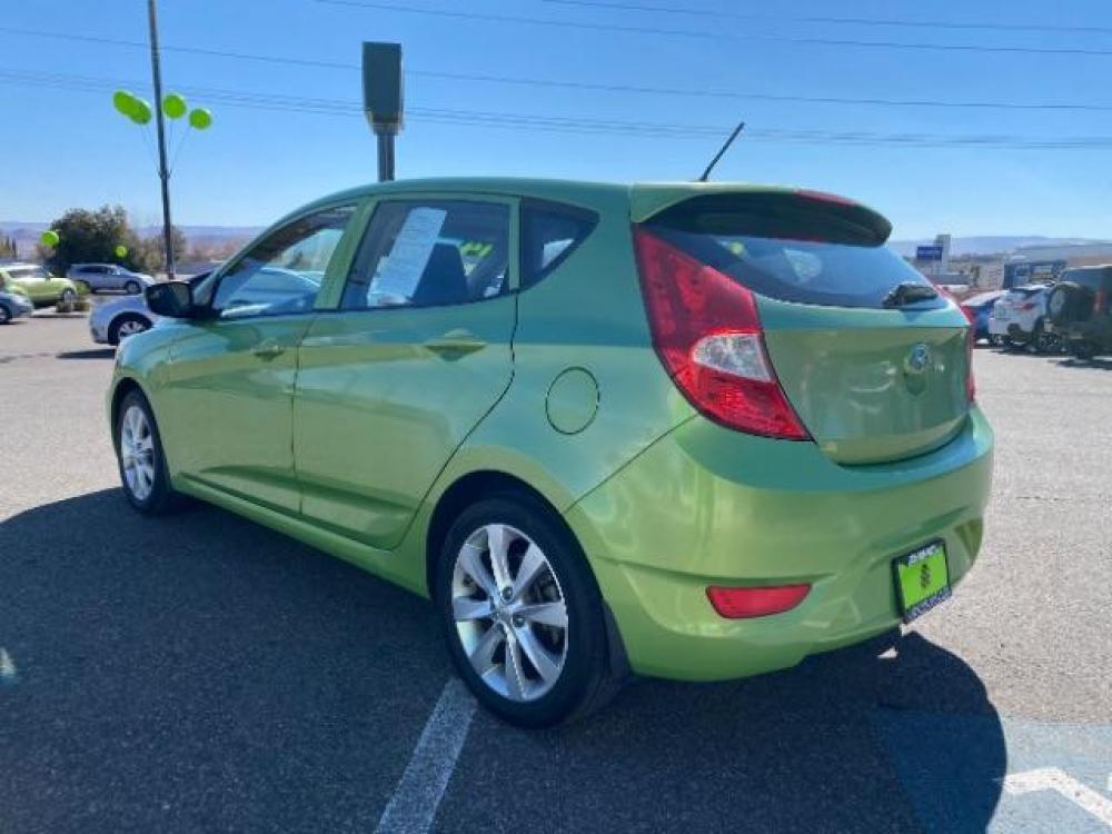 2014 Electrolyte Green Pearl /Black Hyundai Accent SE 5-Door (KMHCU5AE7EU) with an 1.6L L4 DOHC 16V engine, 5-Speed Manual transmission, located at 1865 East Red Hills Pkwy, St. George, 84770, (435) 628-0023, 37.120850, -113.543640 - Photo #4